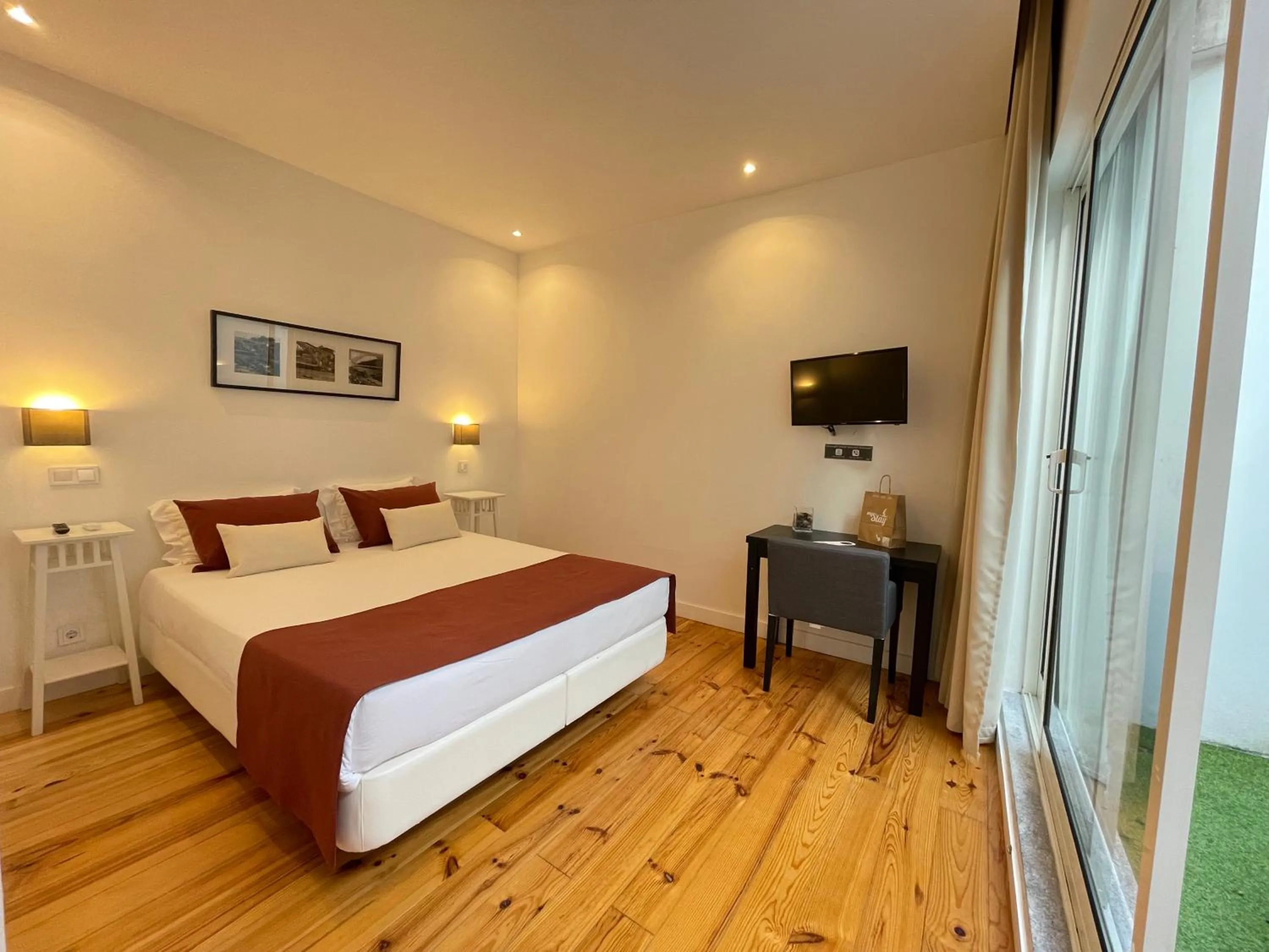 Seating area, Bed in MyStay Porto Centro