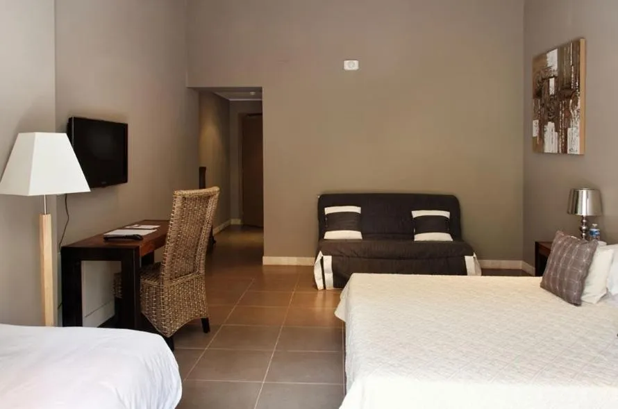 Bed in l'Hotellerie Kouros