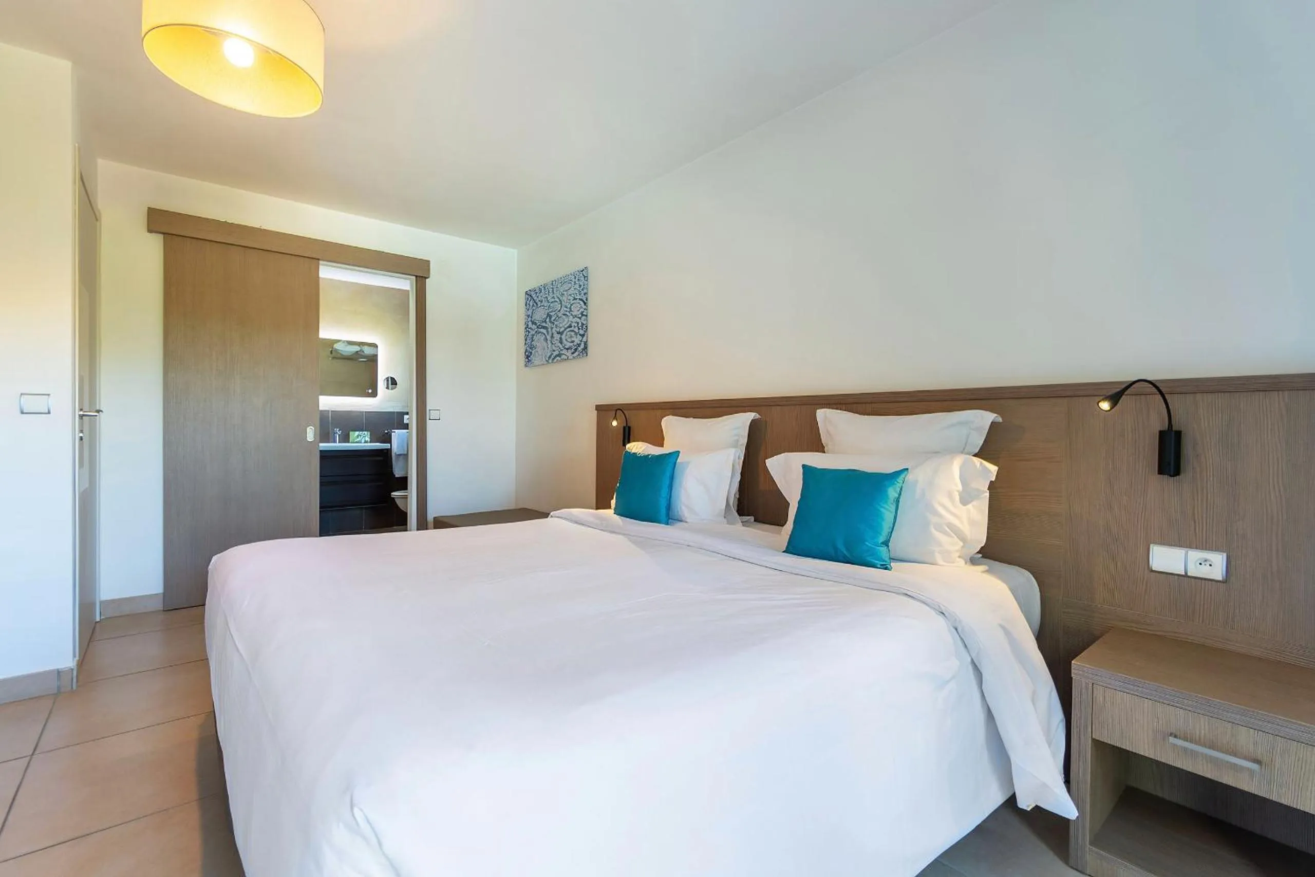 Bed in Domaine Villas Mandarine Private Pools & Spa