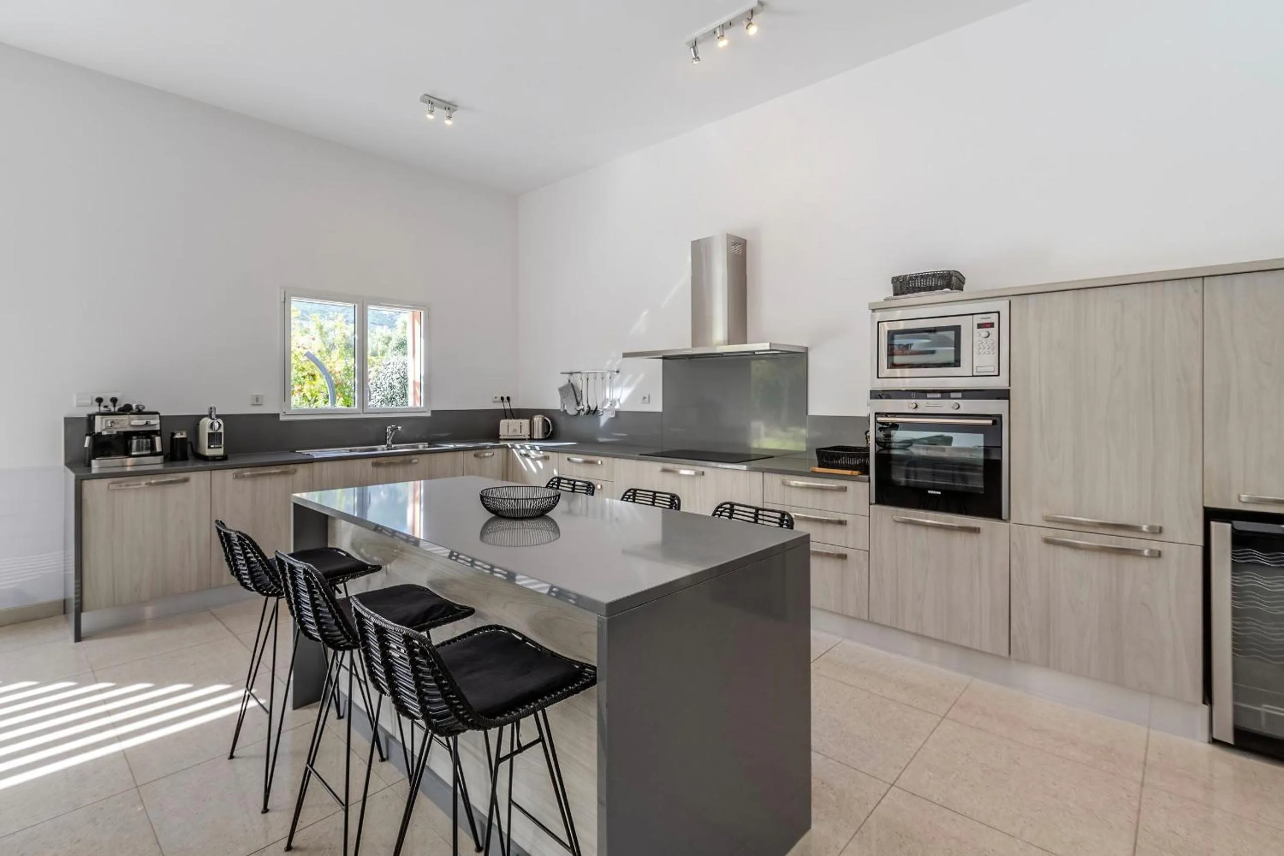 Kitchen or kitchenette in Domaine Villas Mandarine Private Pools & Spa