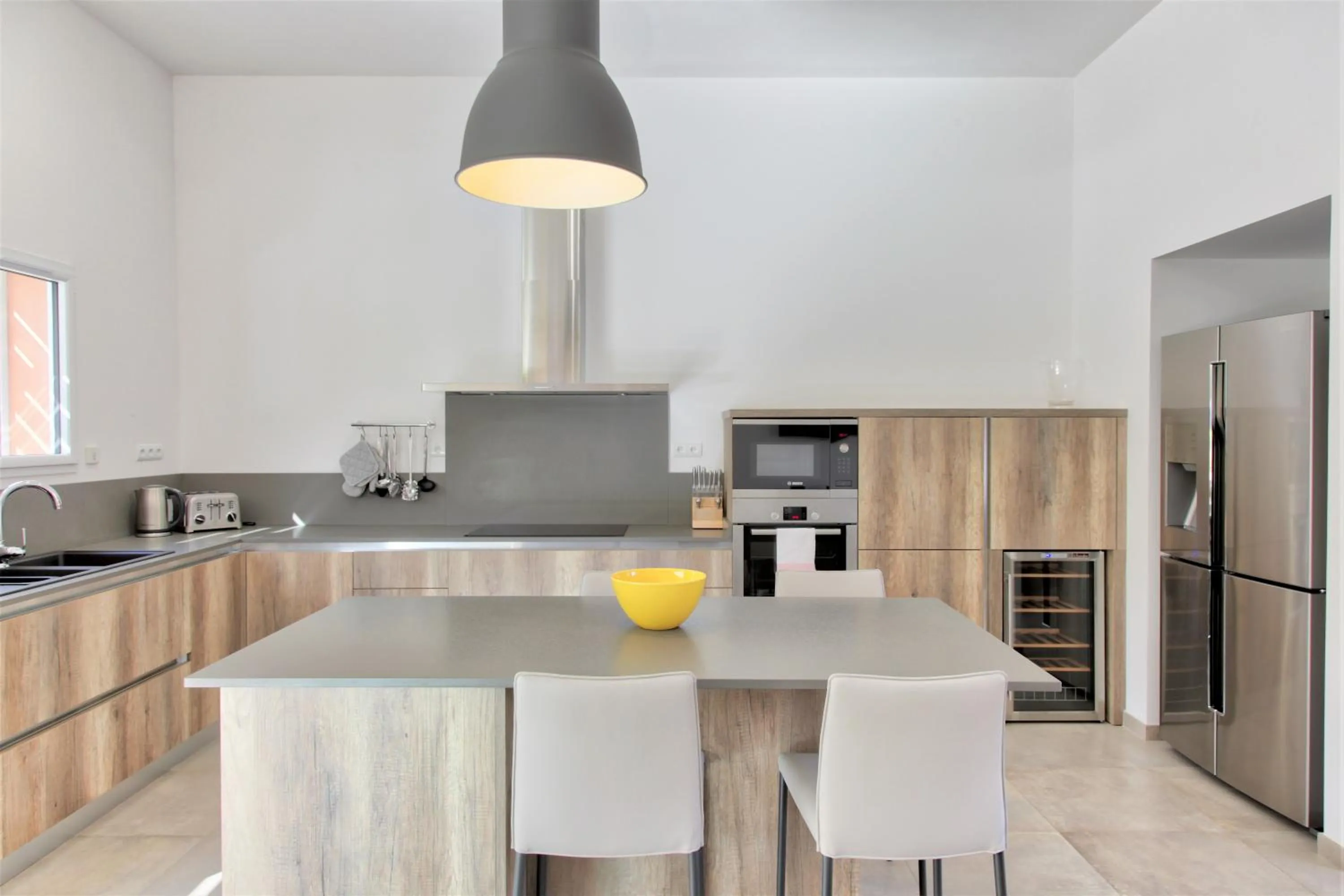 Kitchen or kitchenette in Domaine Villas Mandarine Private Pools & Spa