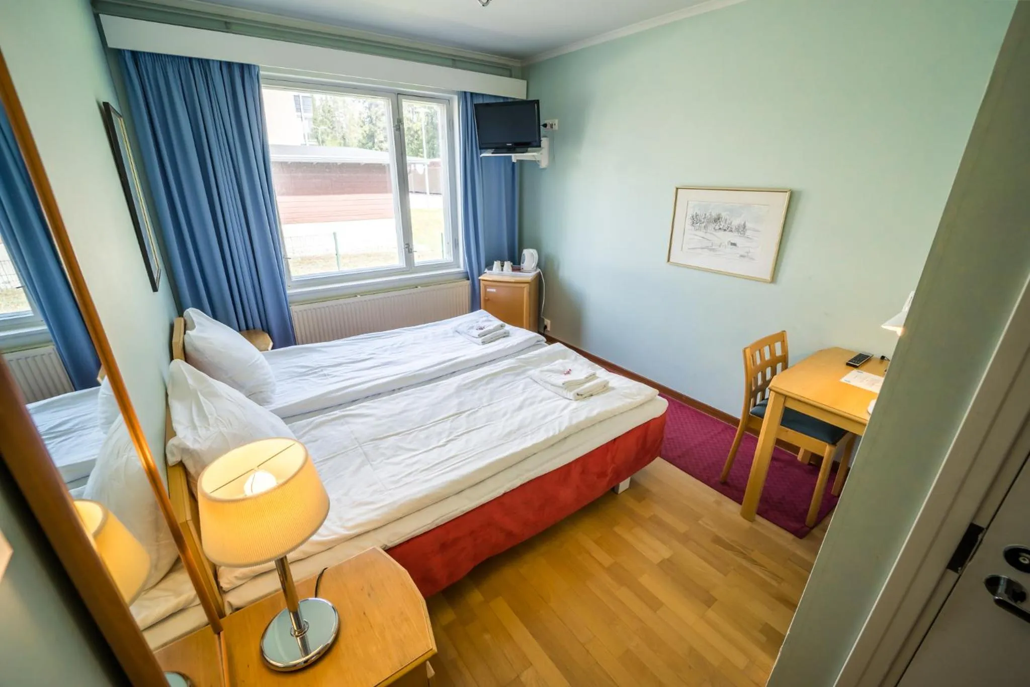 Bed in Karolineburg Manor House Hotel