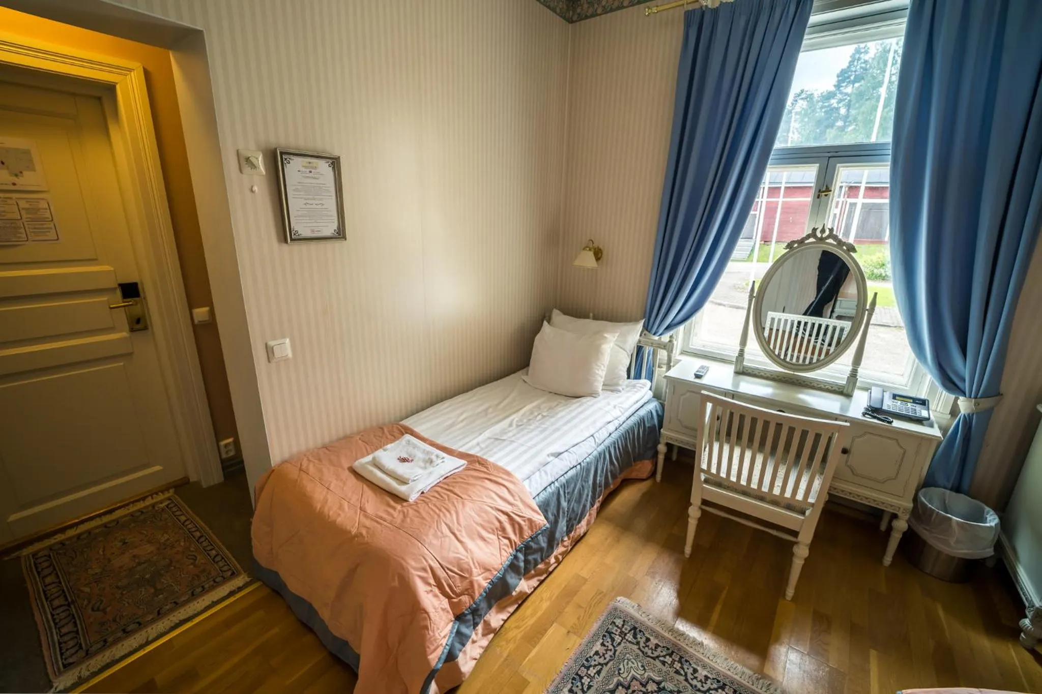 Bed in Karolineburg Manor House Hotel