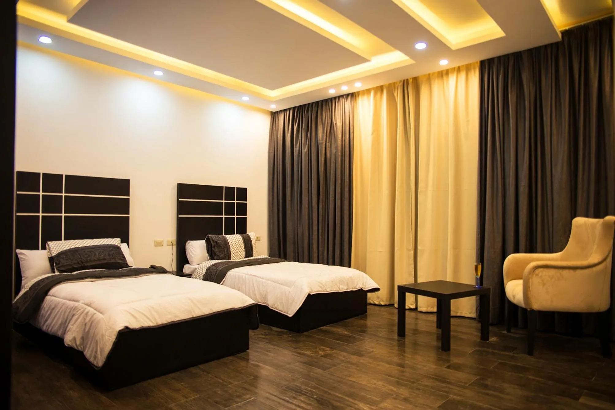 Seating area, Bed in Marvel Stone Hotel