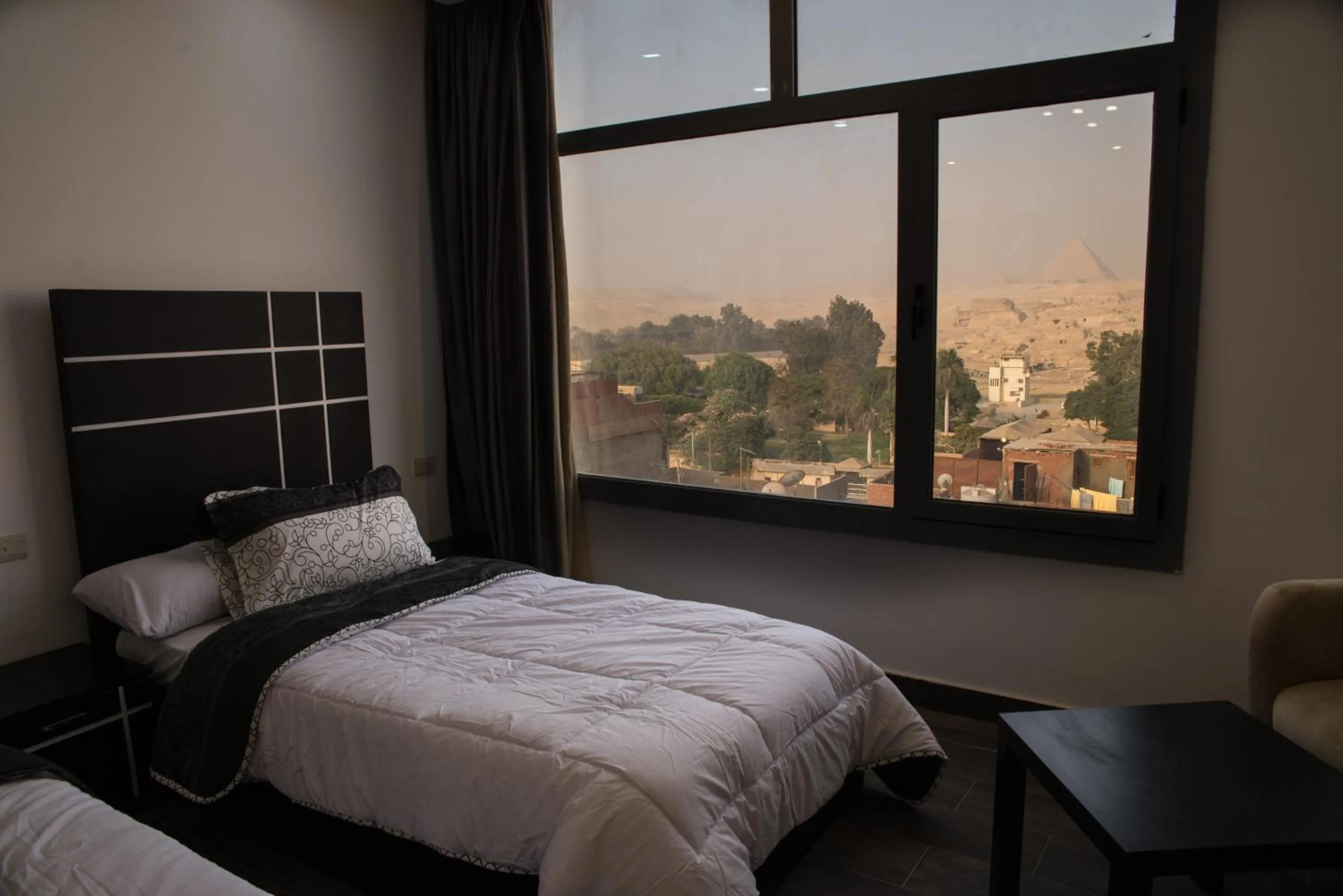 Seating area, Bed in Marvel Stone Hotel