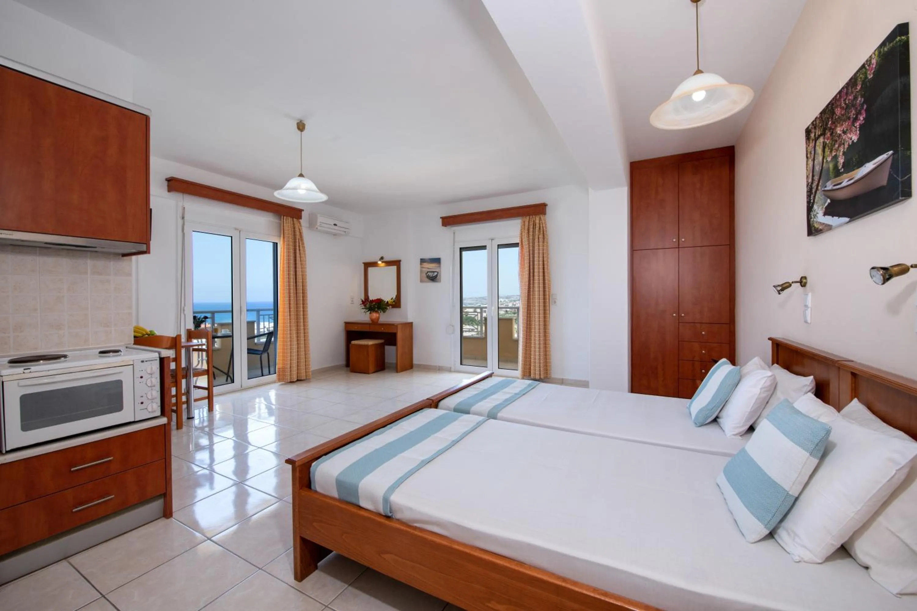 Bed in Sunrise Apartments