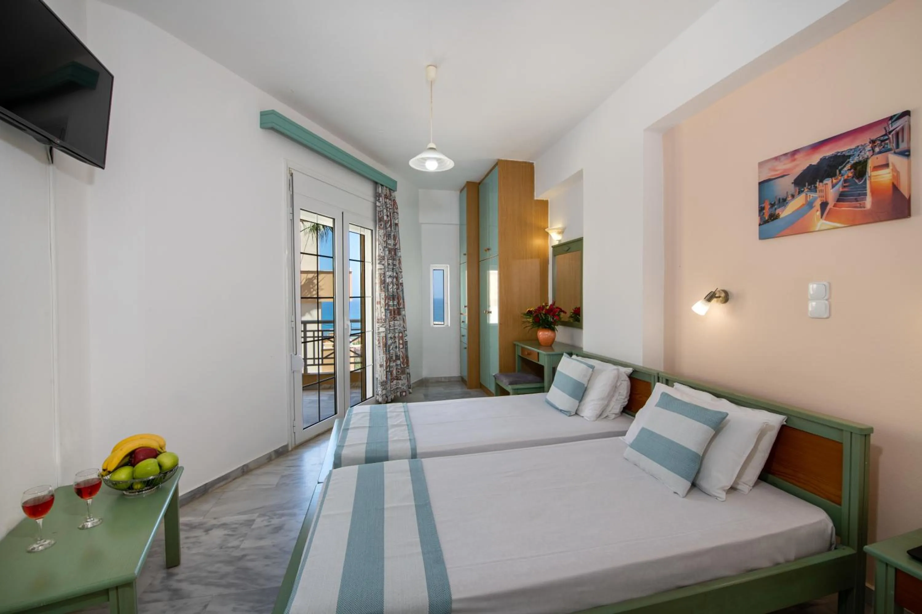 Bed in Sunrise Apartments