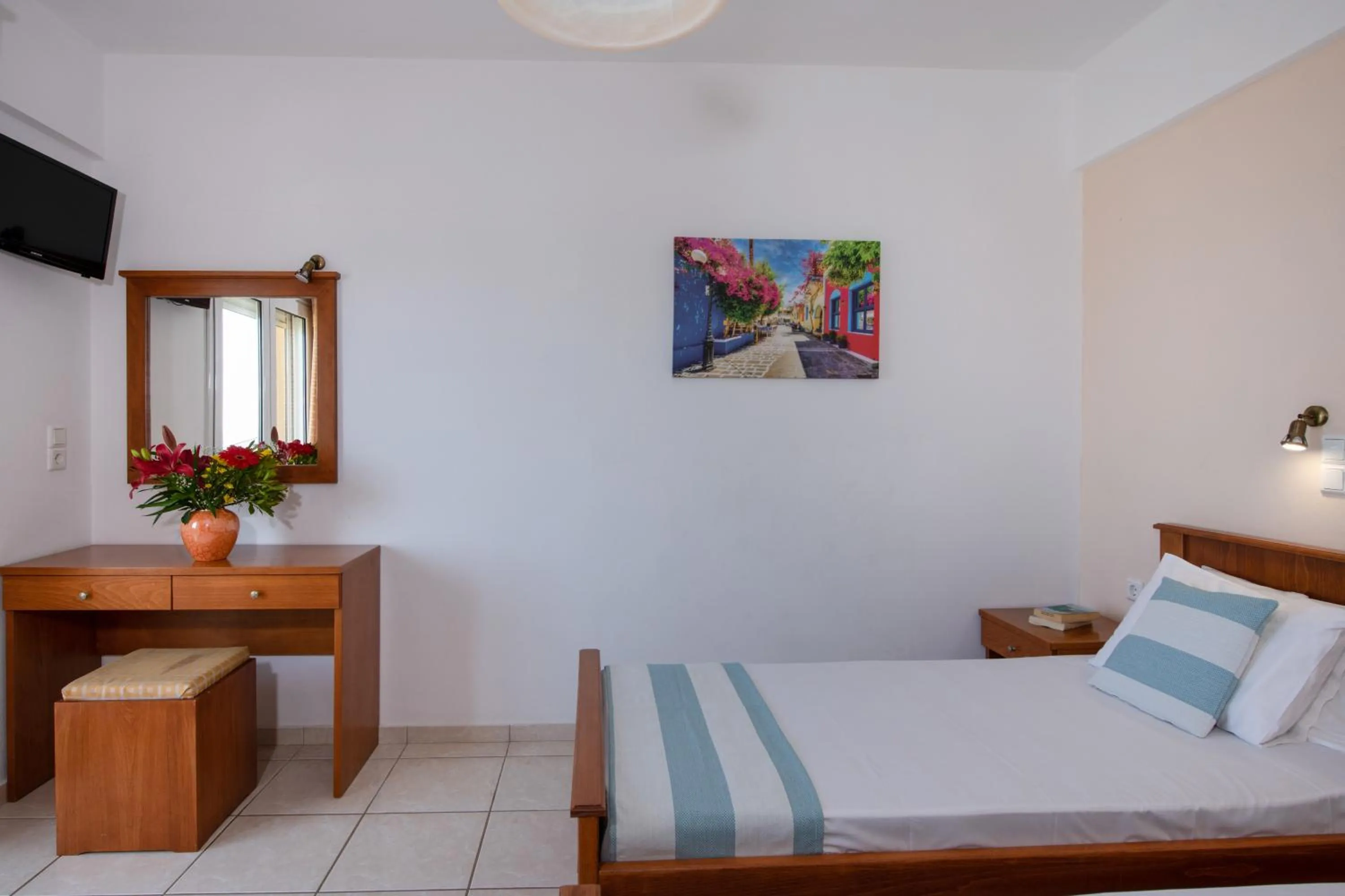 Bed in Sunrise Apartments