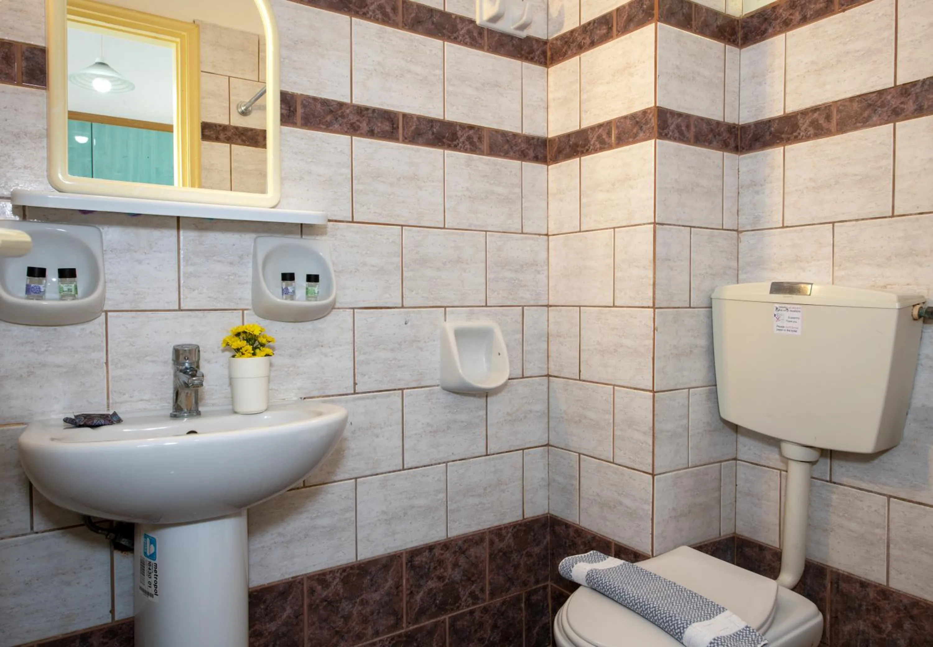 Toilet in Sunrise Apartments