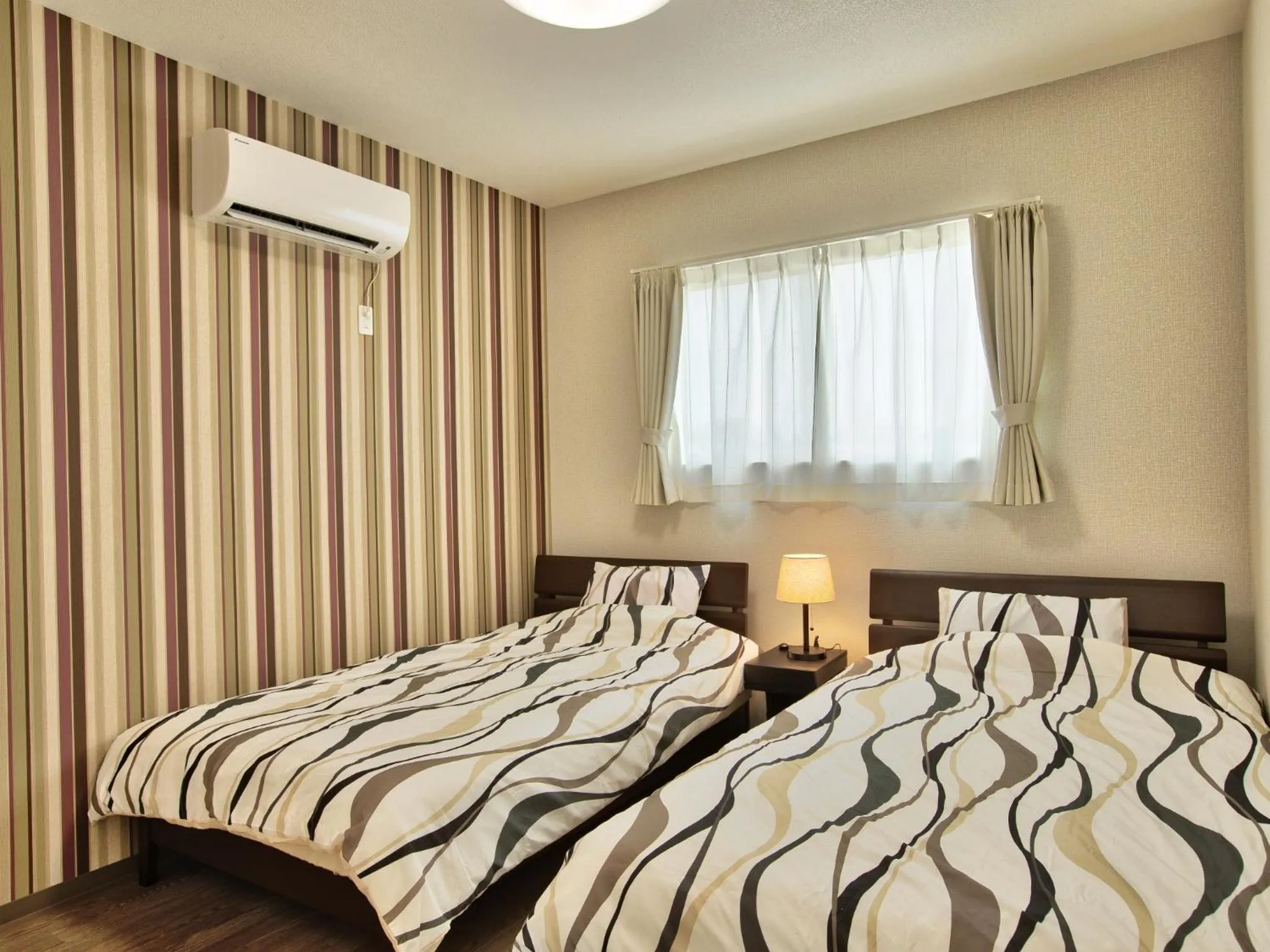 Bedroom, Bed in Cottage Sea Wind Nakijin