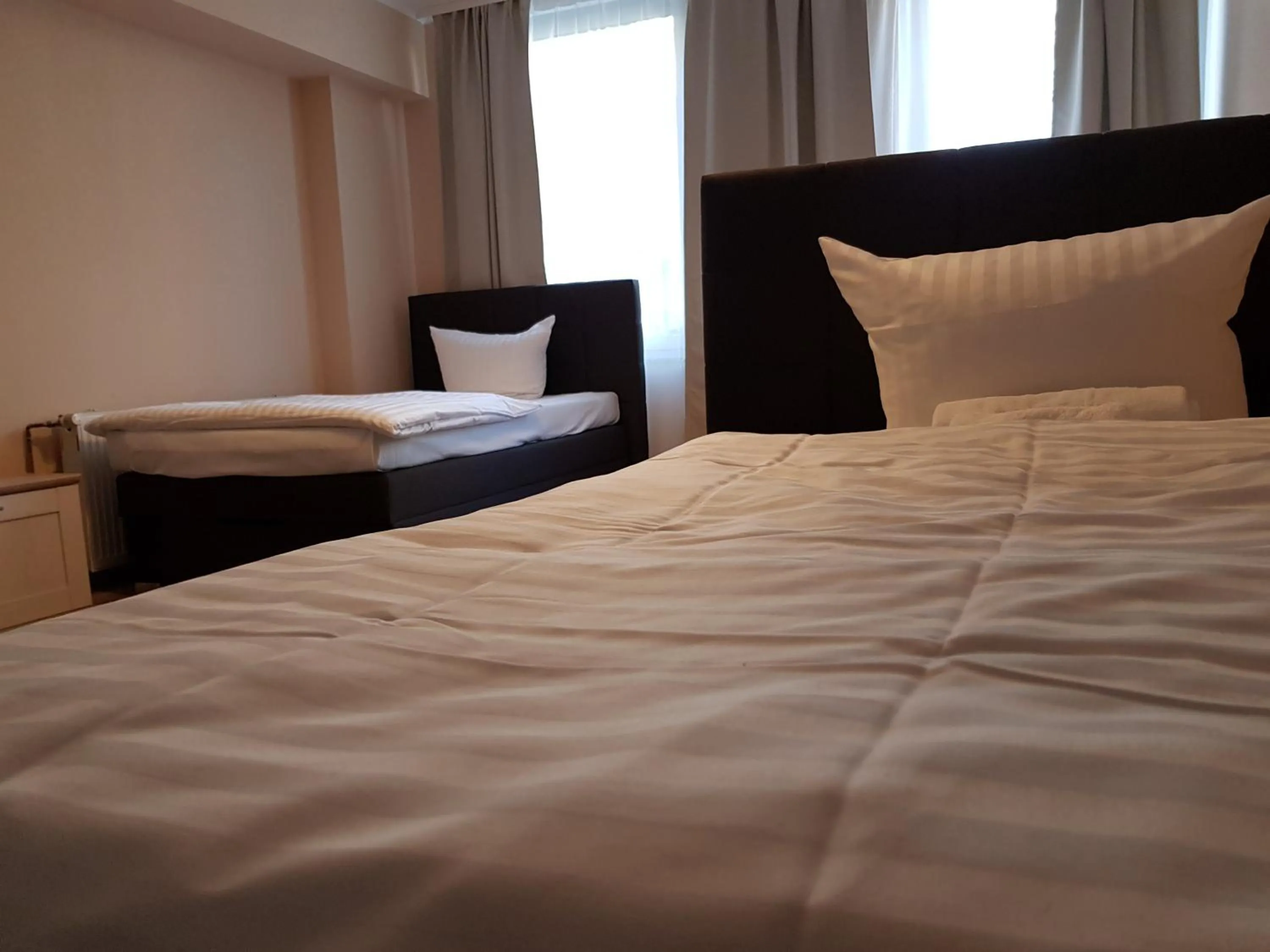 Bed in Hotel-Residenz Oberurseler Hof