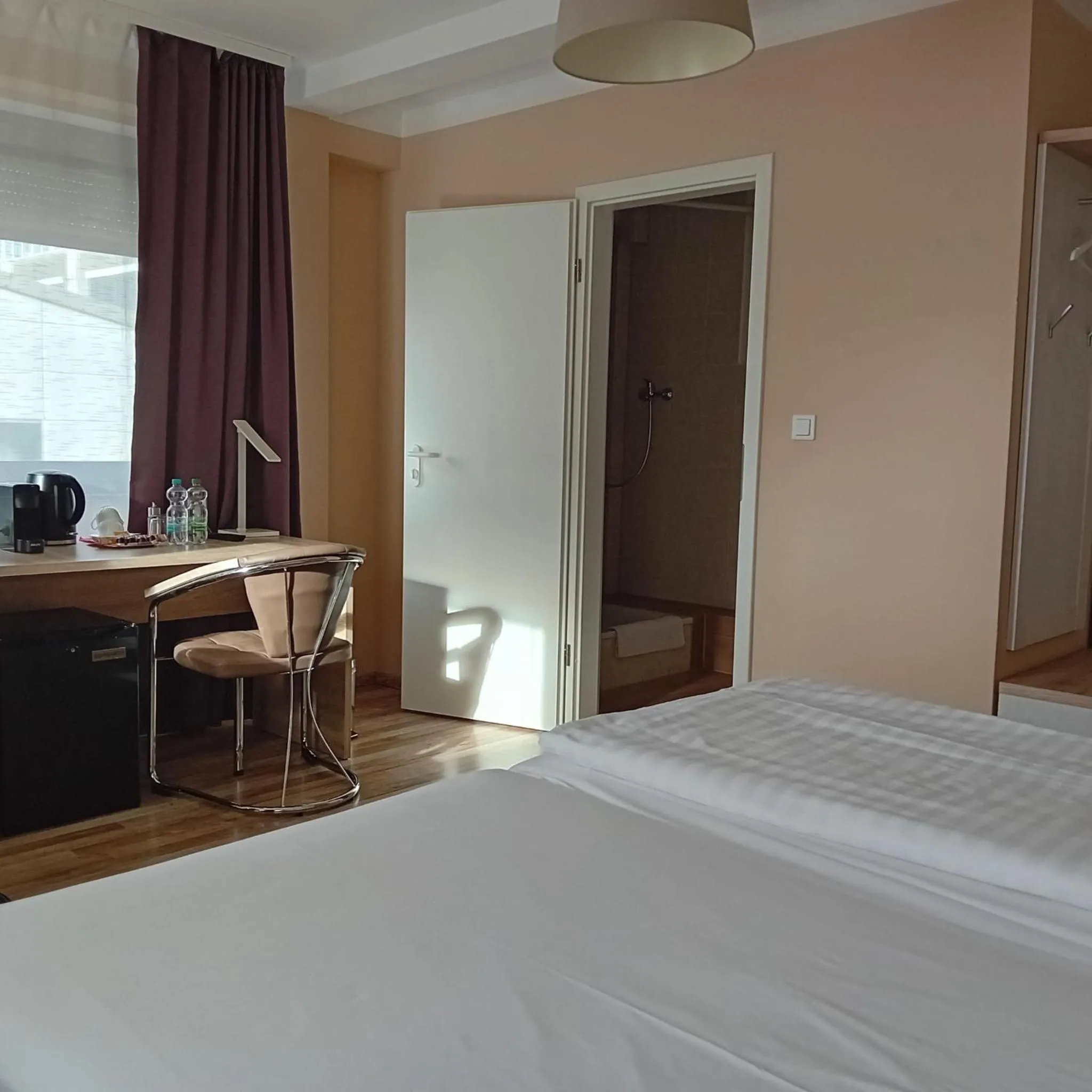 Bed in Hotel-Residenz Oberurseler Hof