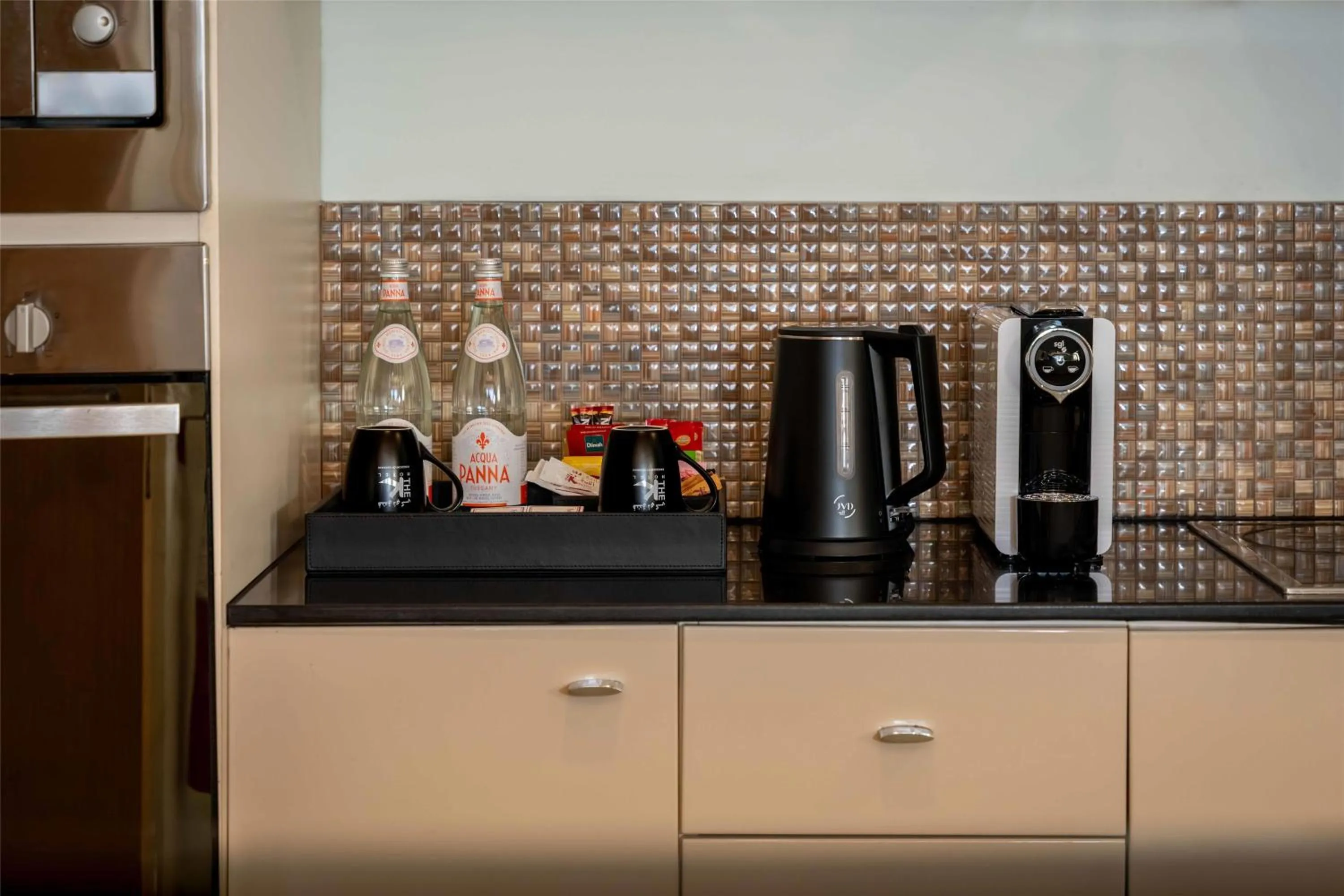 Kitchen or kitchenette in The K Hotel