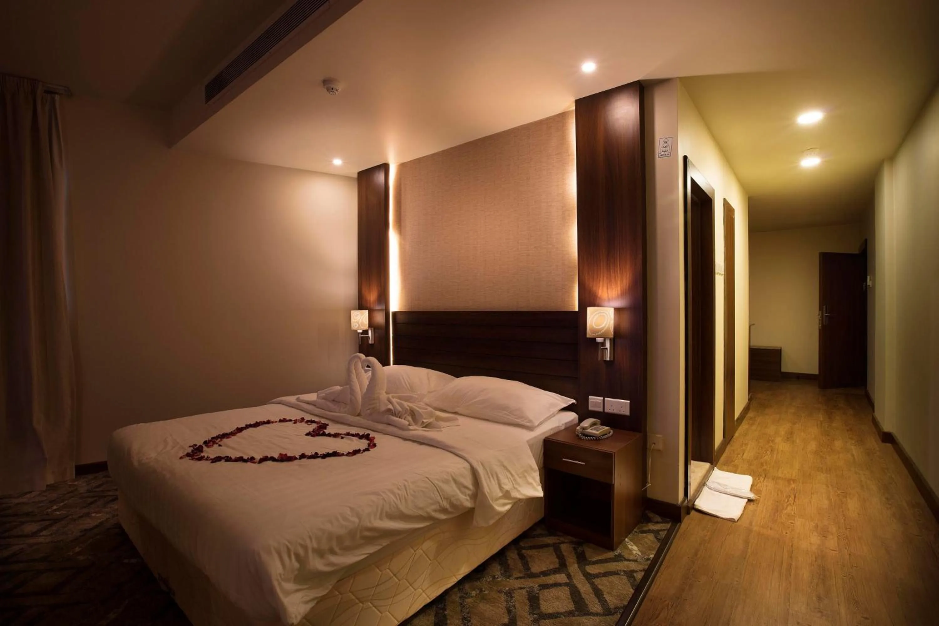 Bed in Lily Hotel Suite Mubarraz