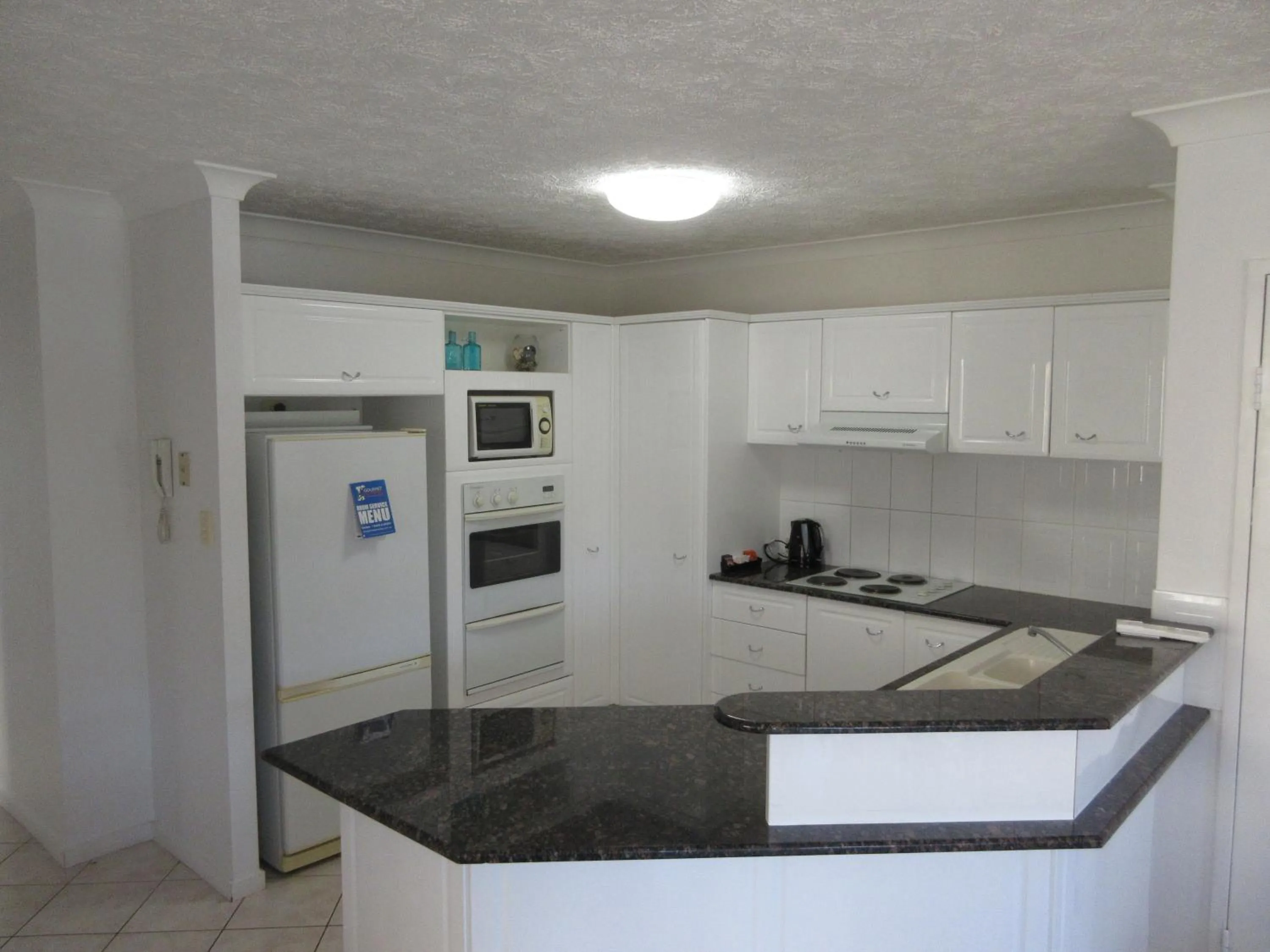 Kitchen or kitchenette in Pacific Place Apartments