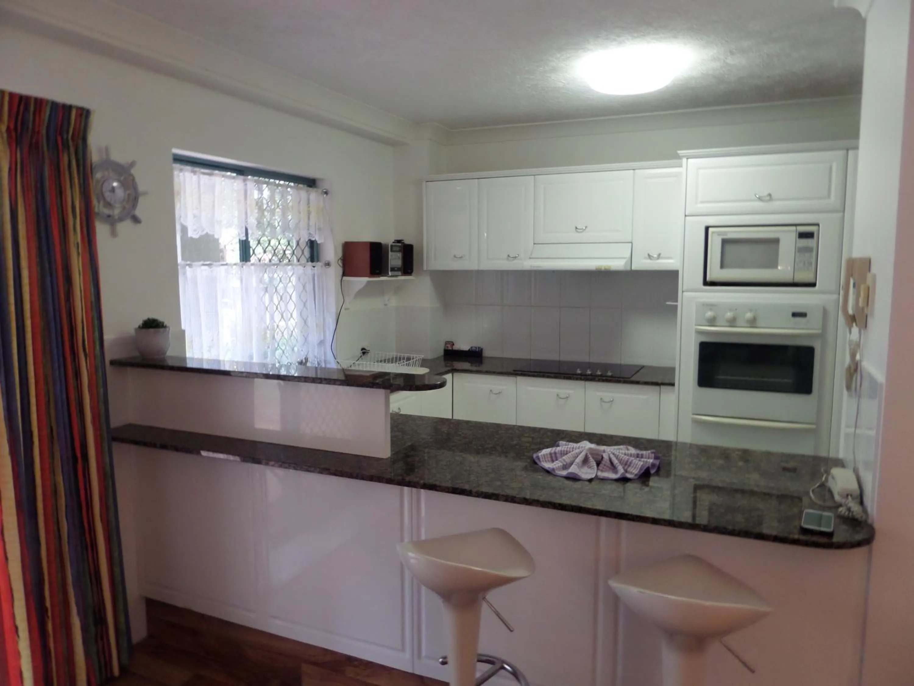 Kitchen or kitchenette in Pacific Place Apartments