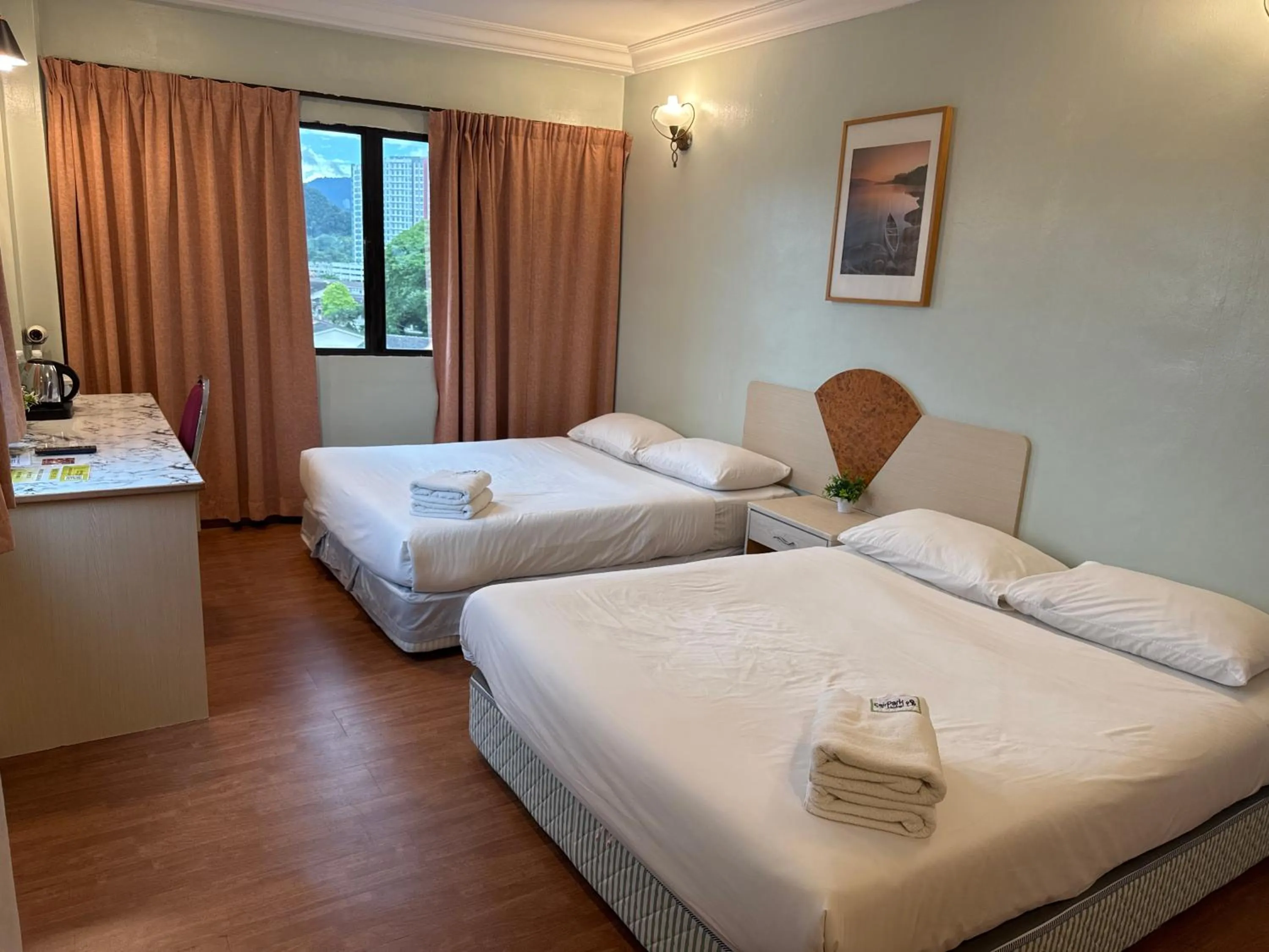 Bed in Fair Park Hotel