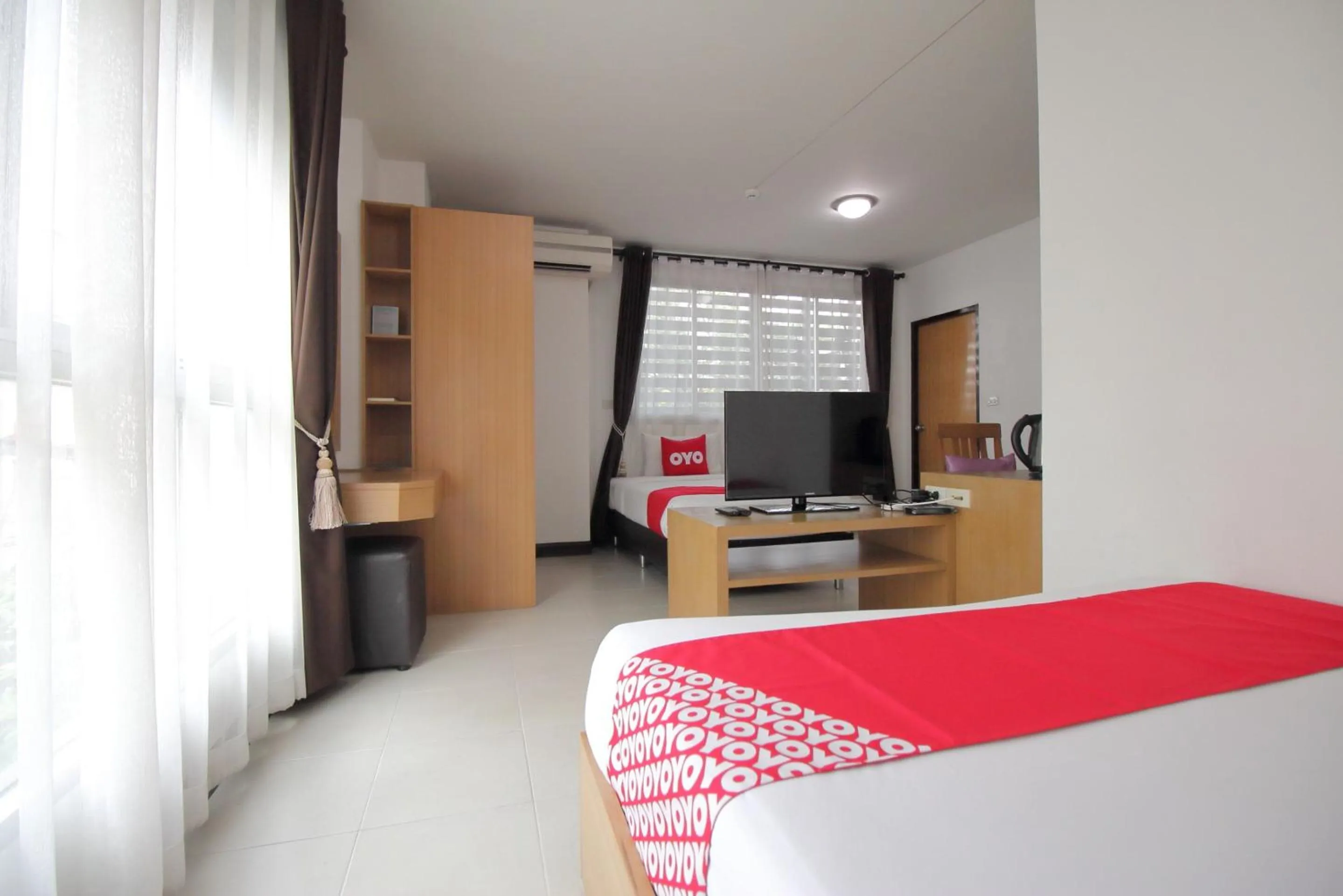 Bedroom in Super OYO Capital O 564 Nature Boutique Hotel