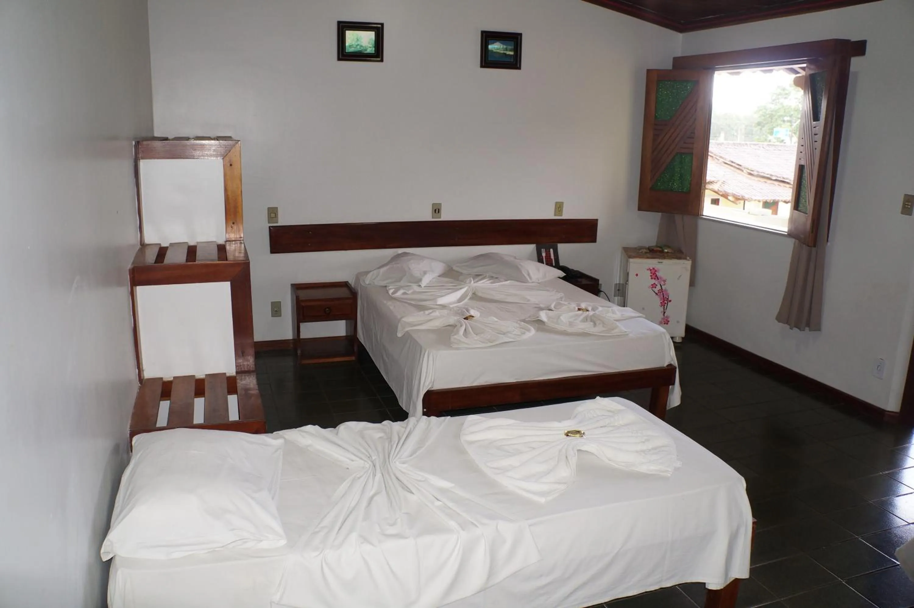 Bed in Pousada Do Bosque