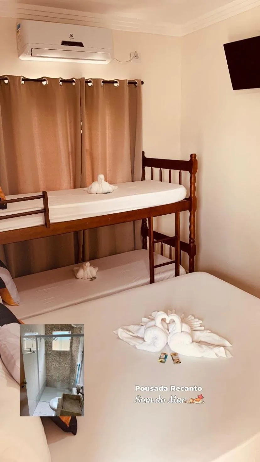 Bed in Pousada Recanto Som do Mar