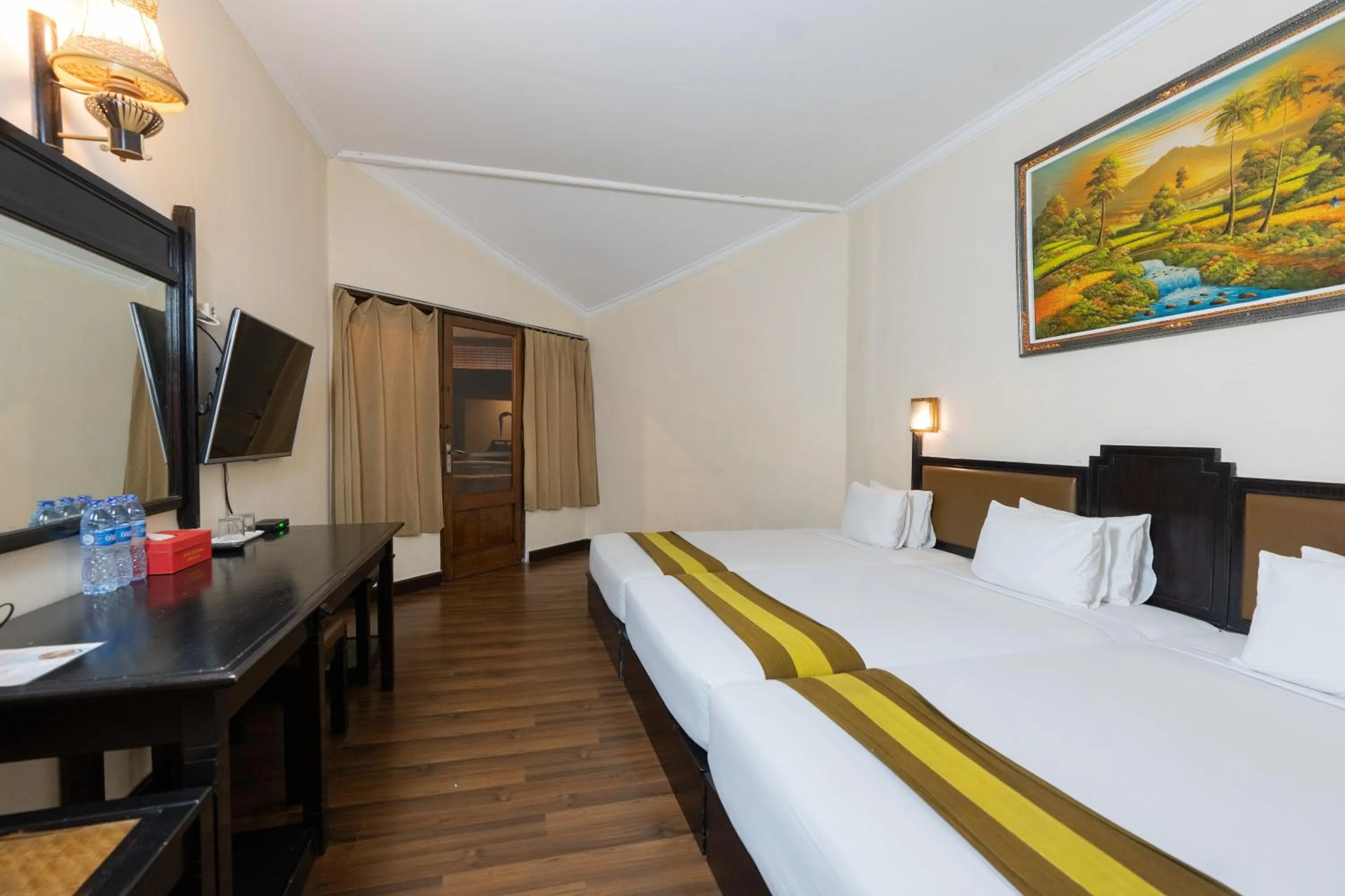 Bed in The Flora Kuta Bali