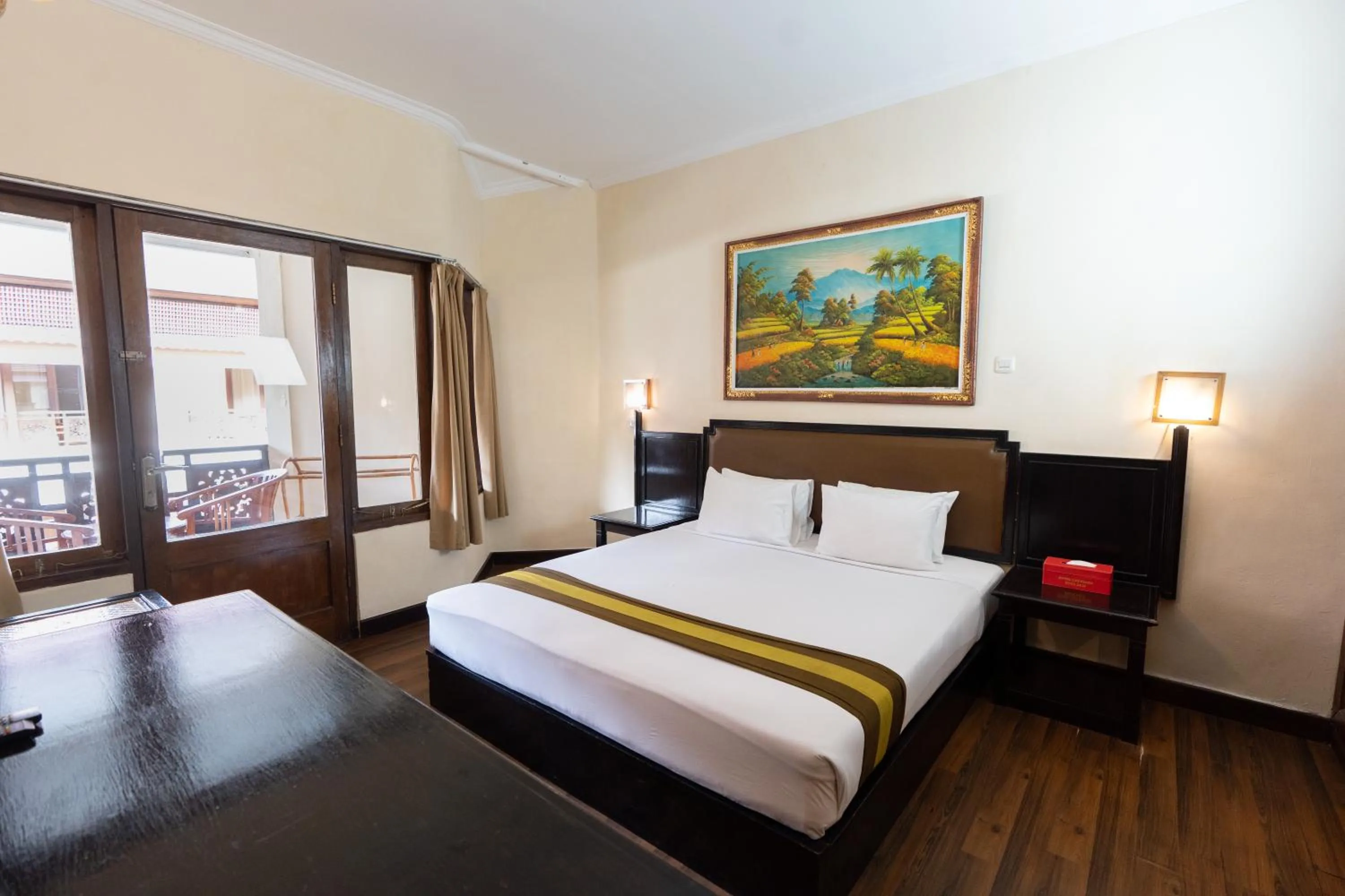 Bed in The Flora Kuta Bali