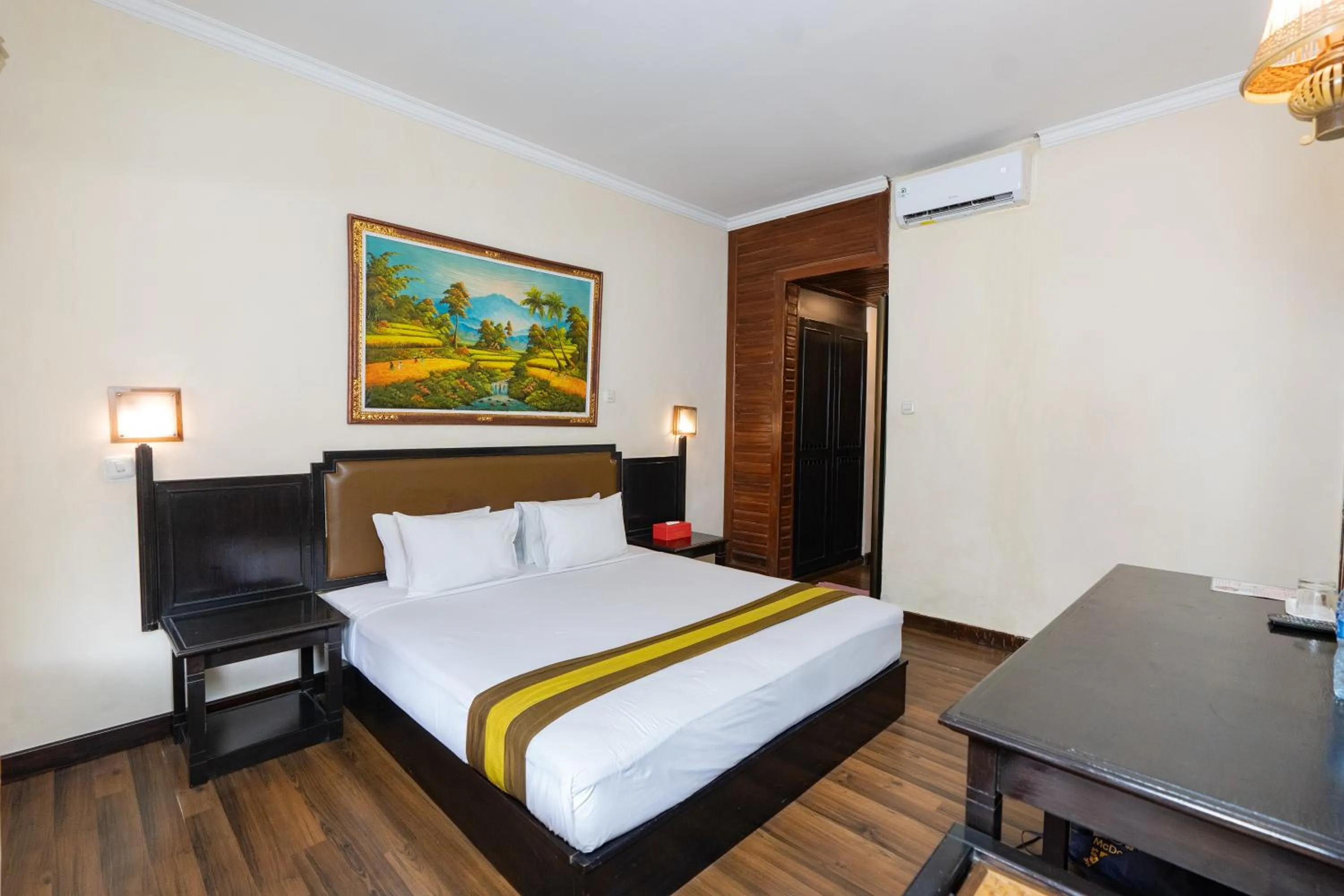 Bed in The Flora Kuta Bali