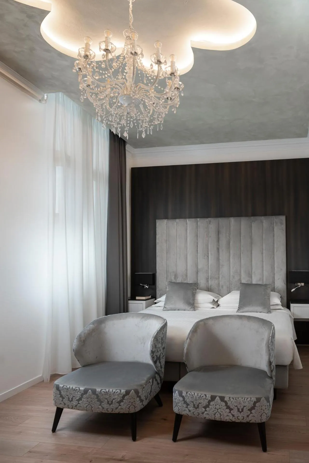 Photo of the whole room, Bed in Albergo Rossini 1936