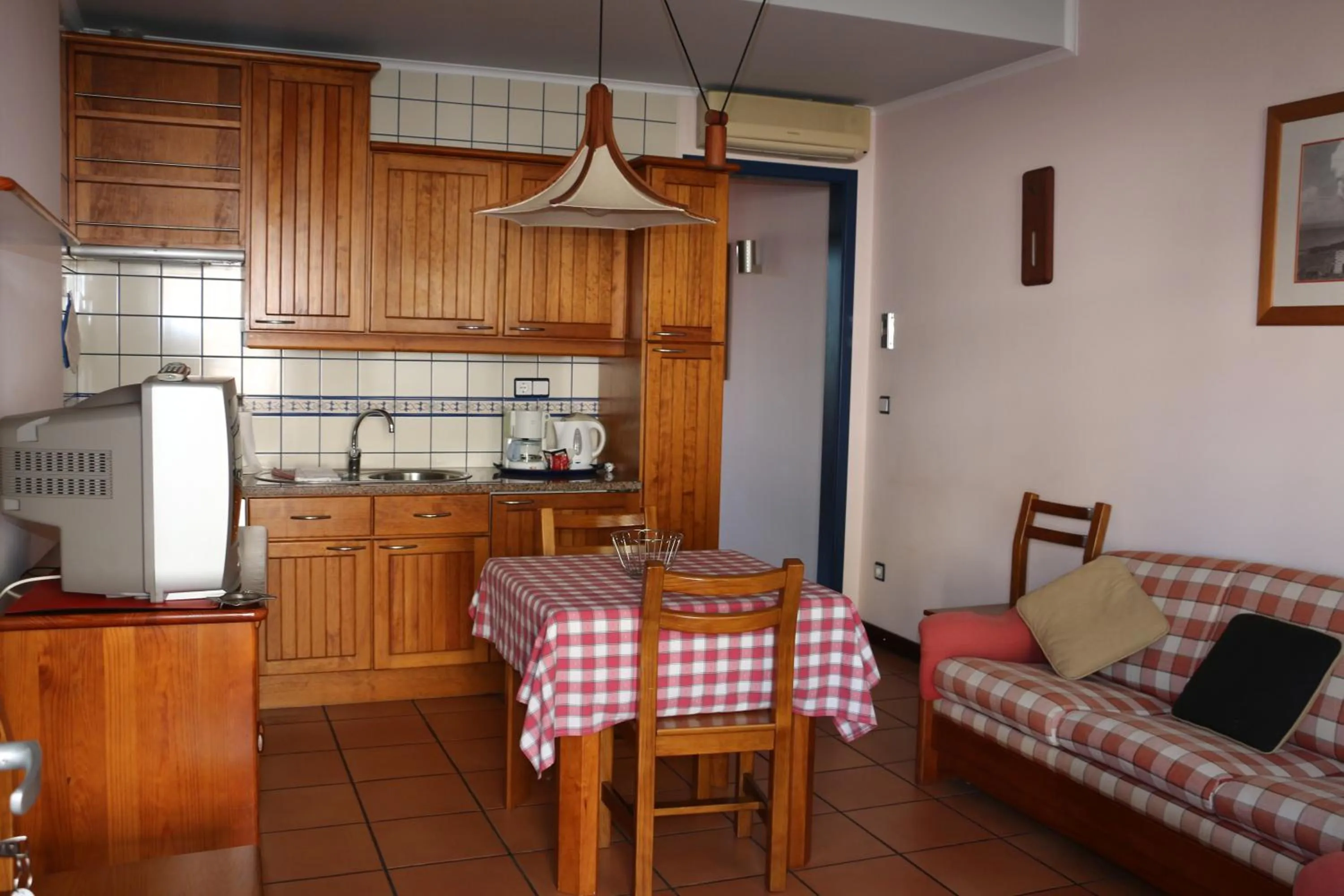 Kitchen or kitchenette in Apartamentos Turisticos Verdemar
