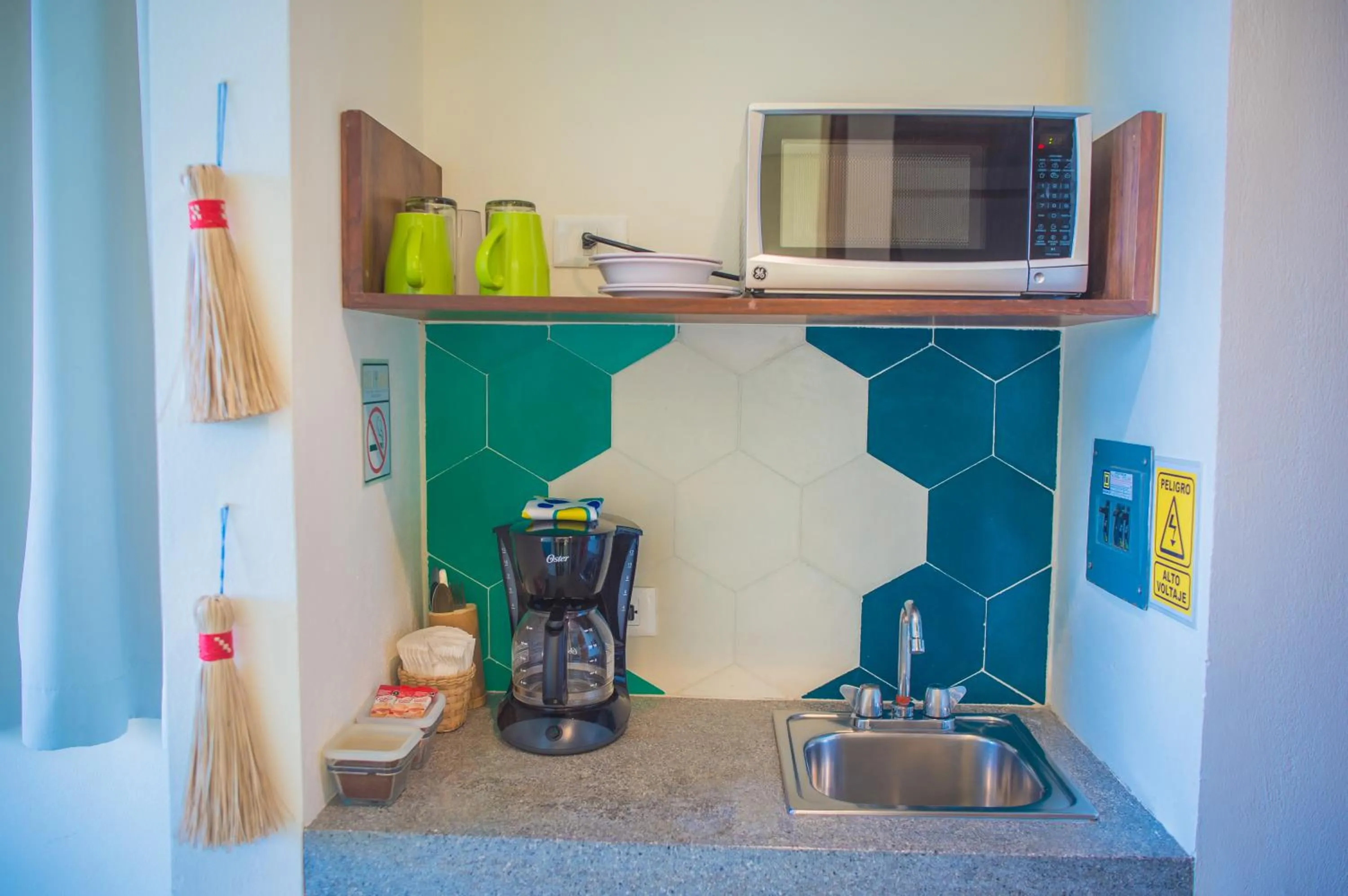 Kitchen or kitchenette in Suites Cielo y Mar