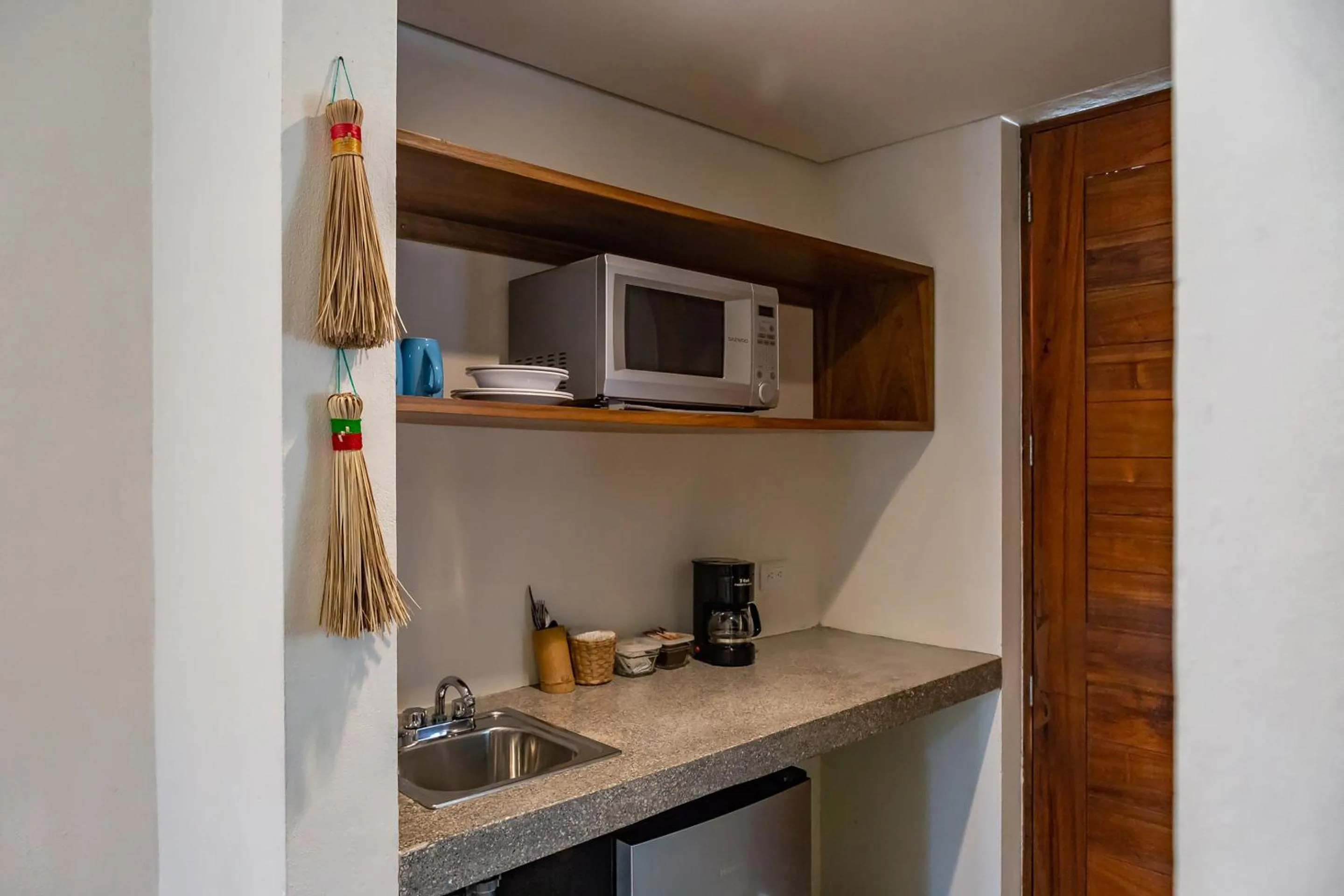 Kitchen or kitchenette in Suites Cielo y Mar