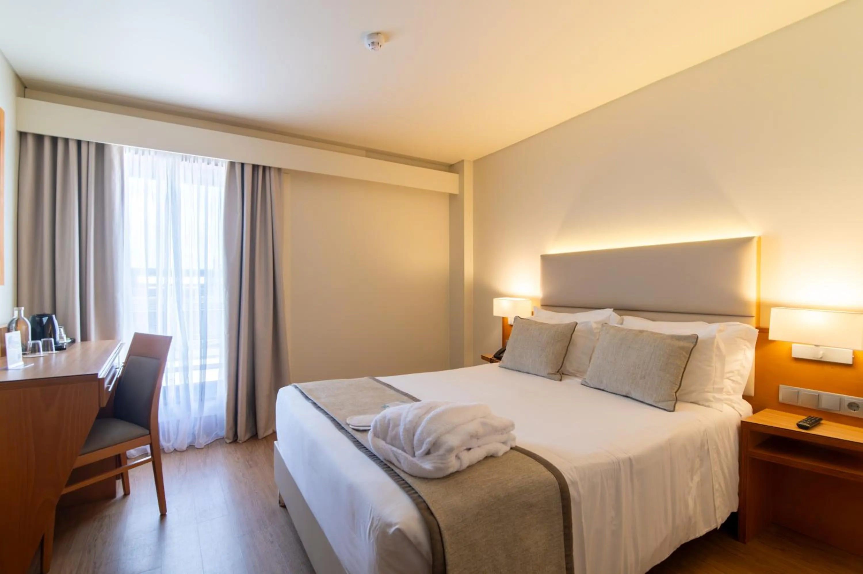 Bed in The Azoriani Boutique, Ascend Hotel Collection