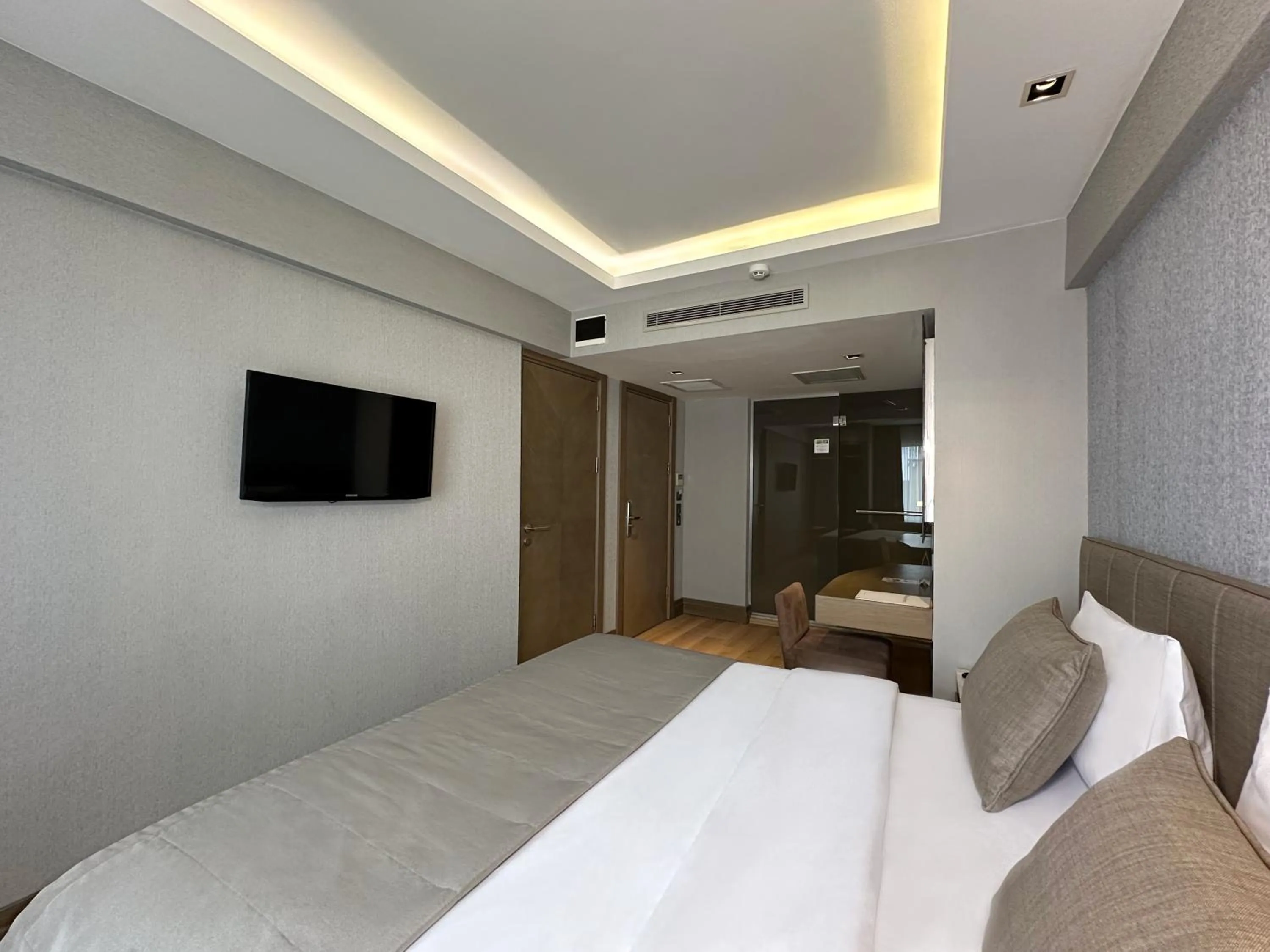 Bed in AHC Grand Bazaar Hotel