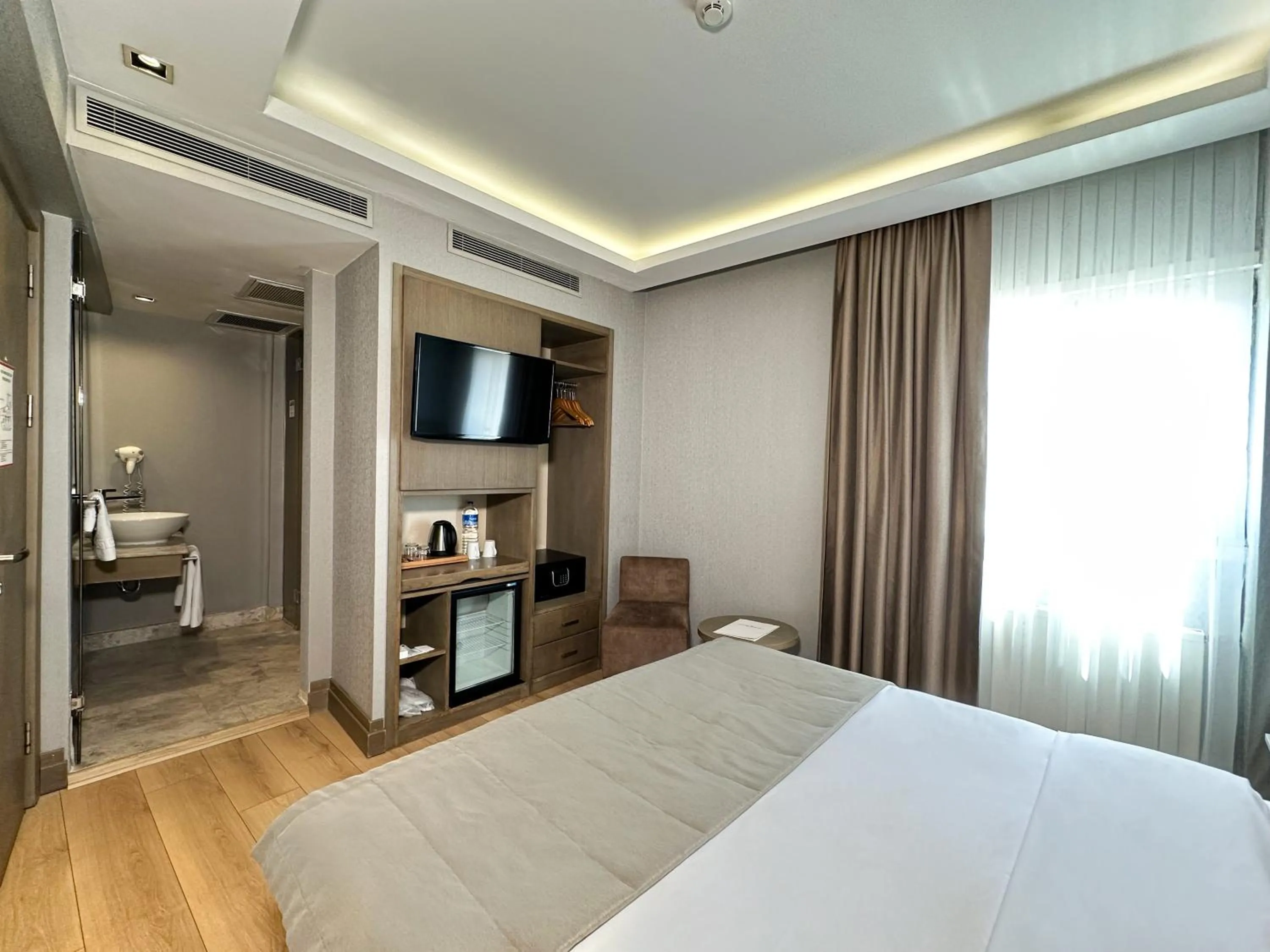 Bed in AHC Grand Bazaar Hotel