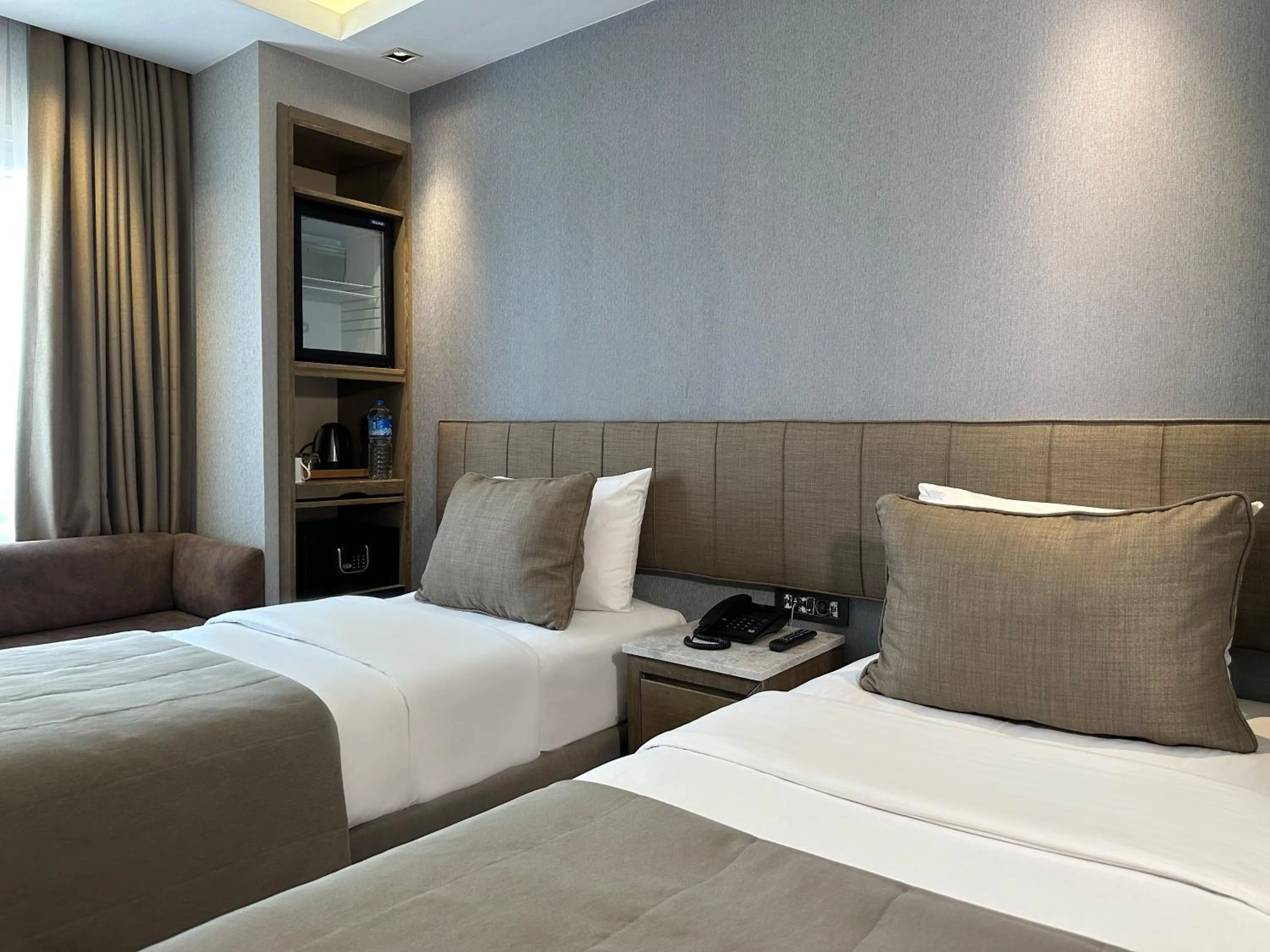 Bed in AHC Grand Bazaar Hotel