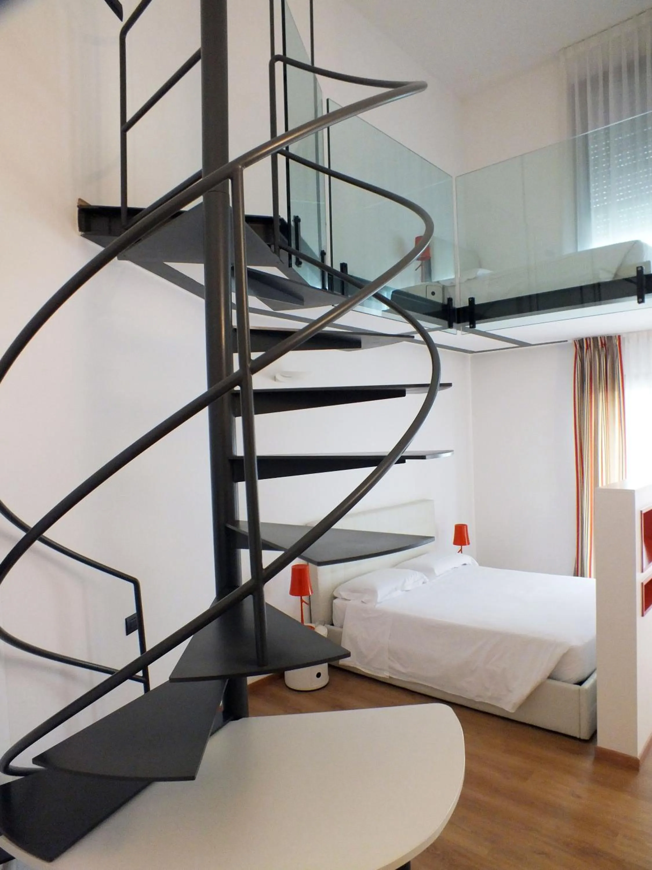 Bed in BB Hotels Aparthotel Isola