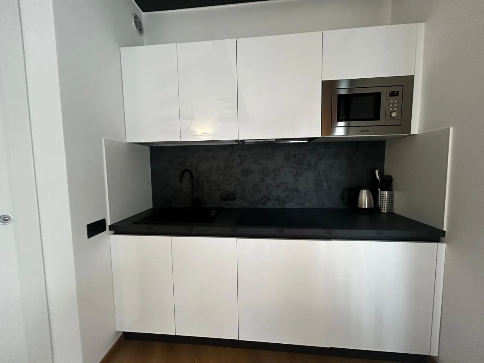 Kitchen or kitchenette in BB Hotels Aparthotel Isola