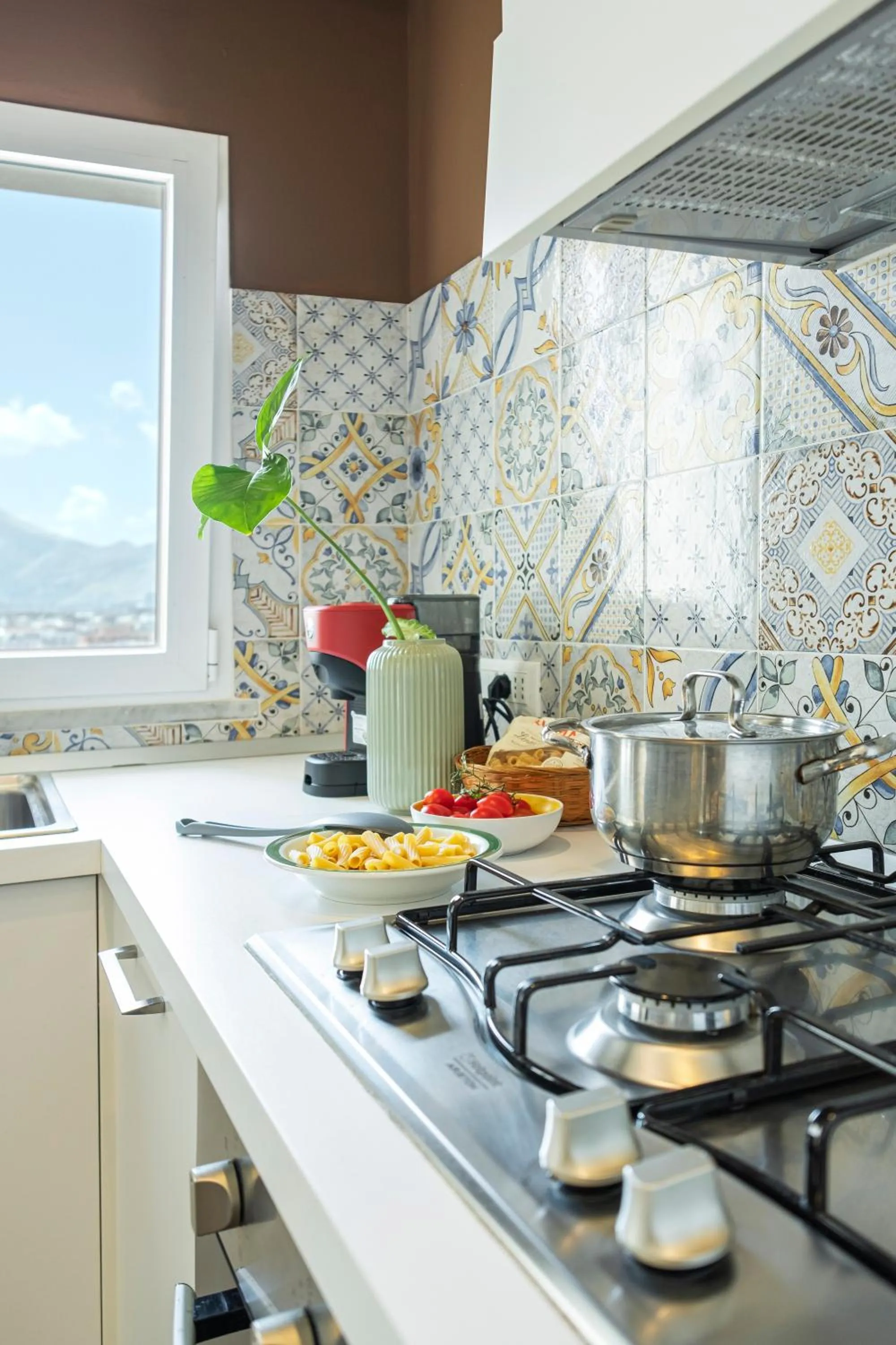 stove in Marbela Apartments & Suites