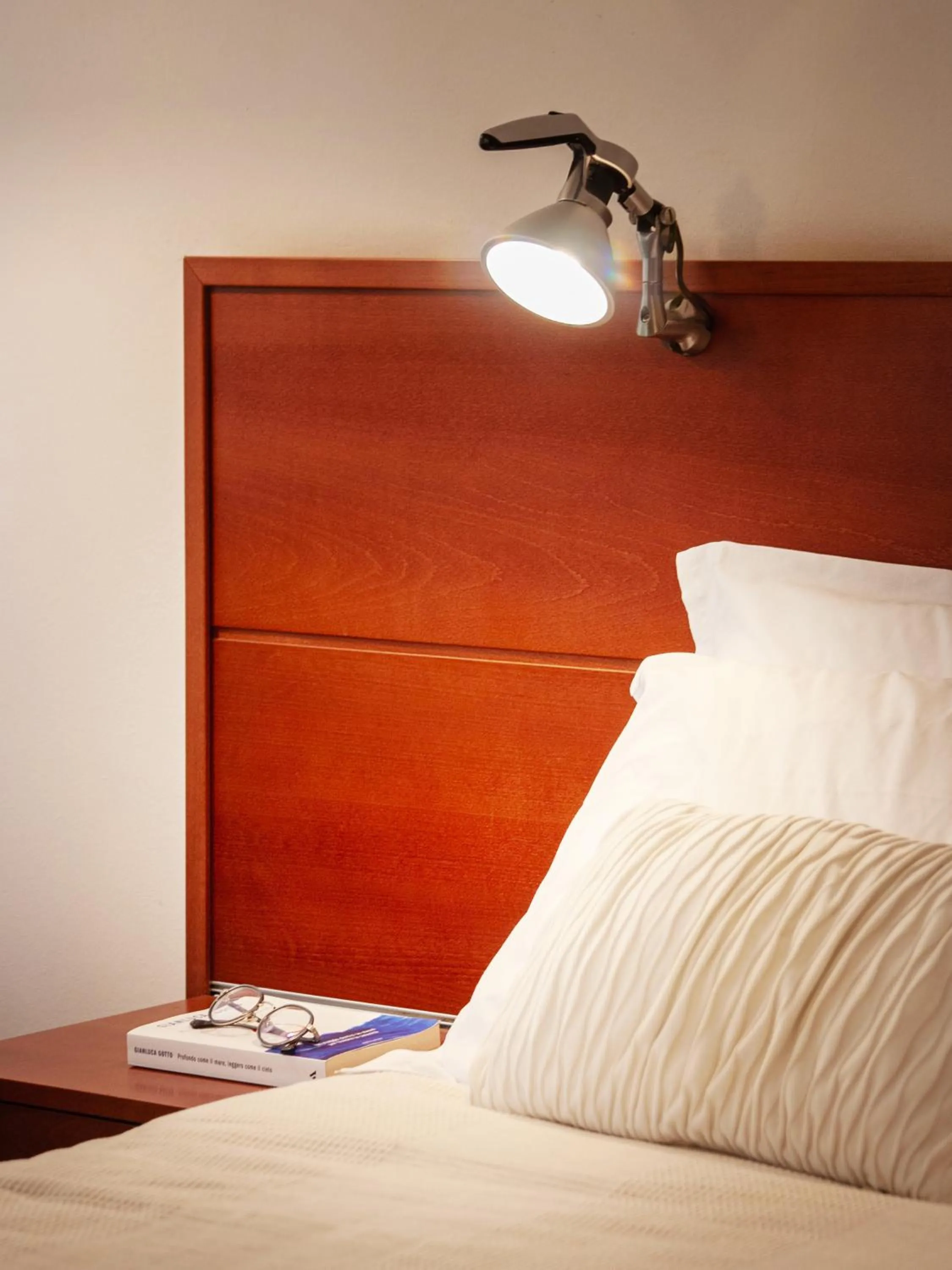 Bed in Marbela Apartments & Suites