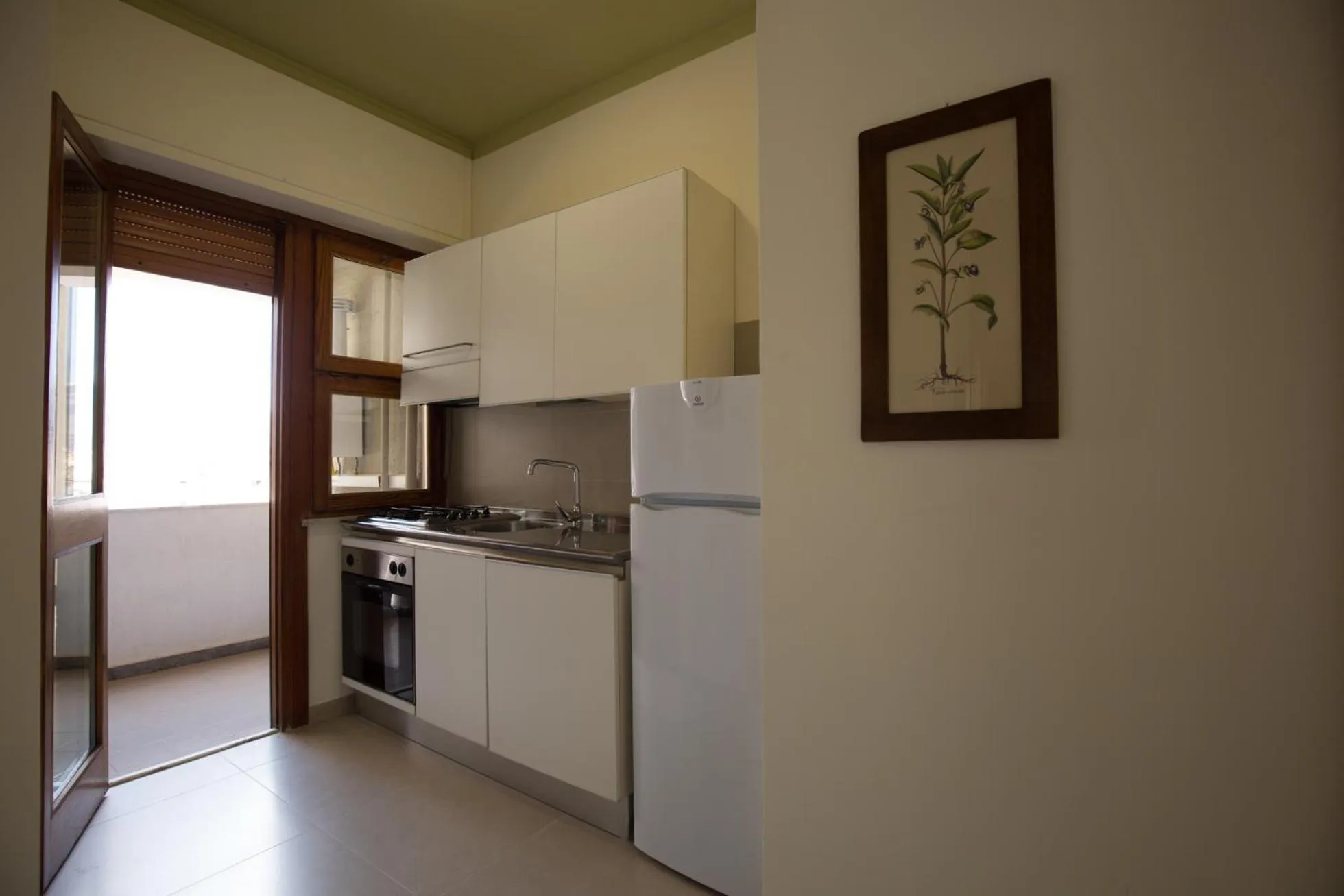 Kitchen or kitchenette in Marbela Apartments & Suites
