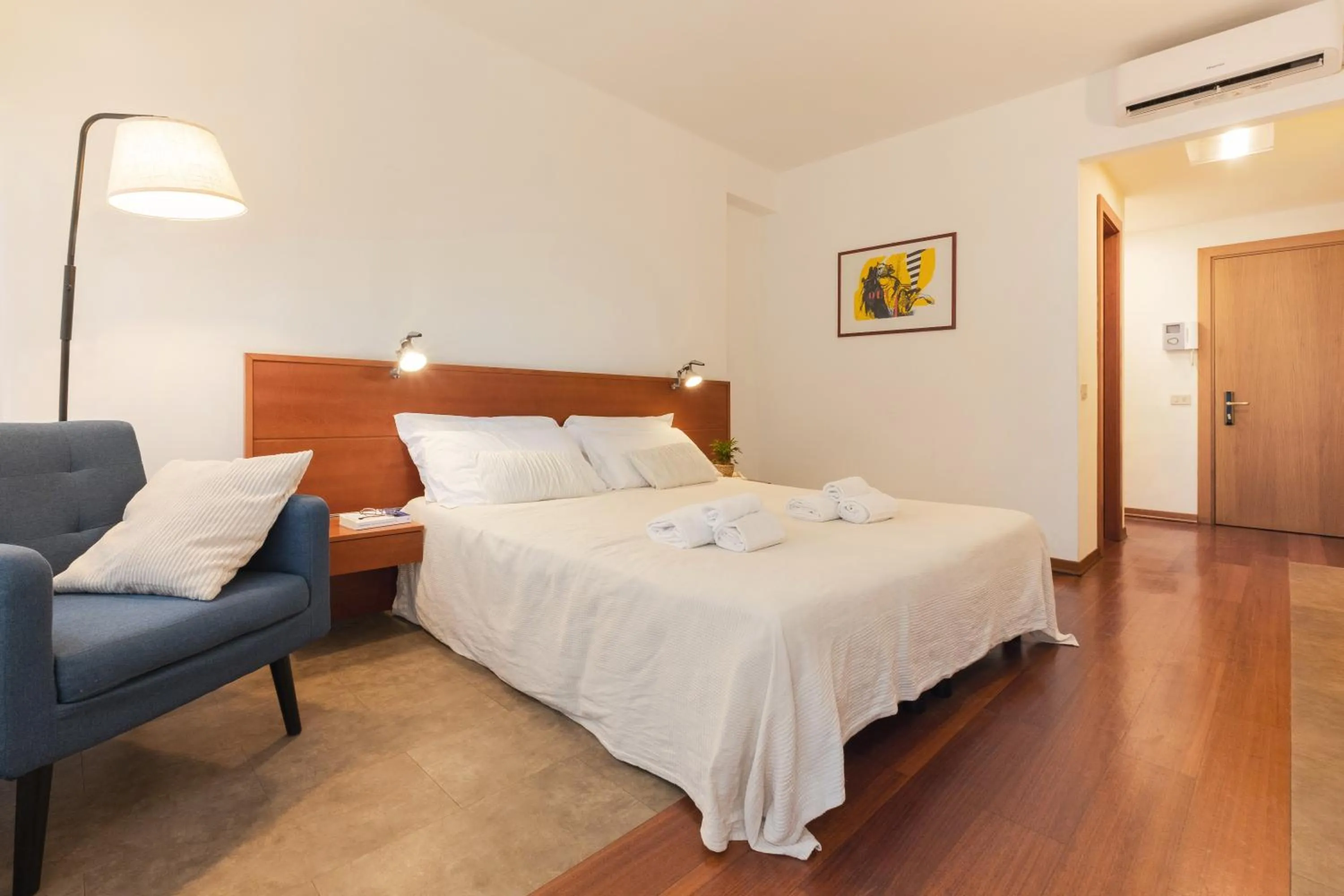 Bed in Marbela Apartments & Suites