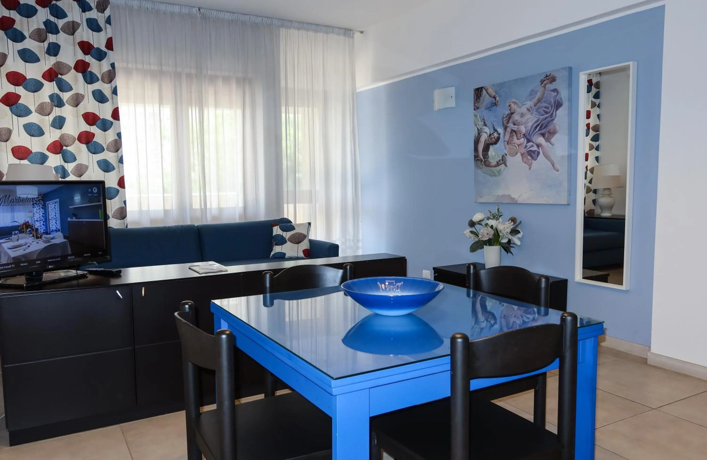 Seating area in Marbela Apartments & Suites