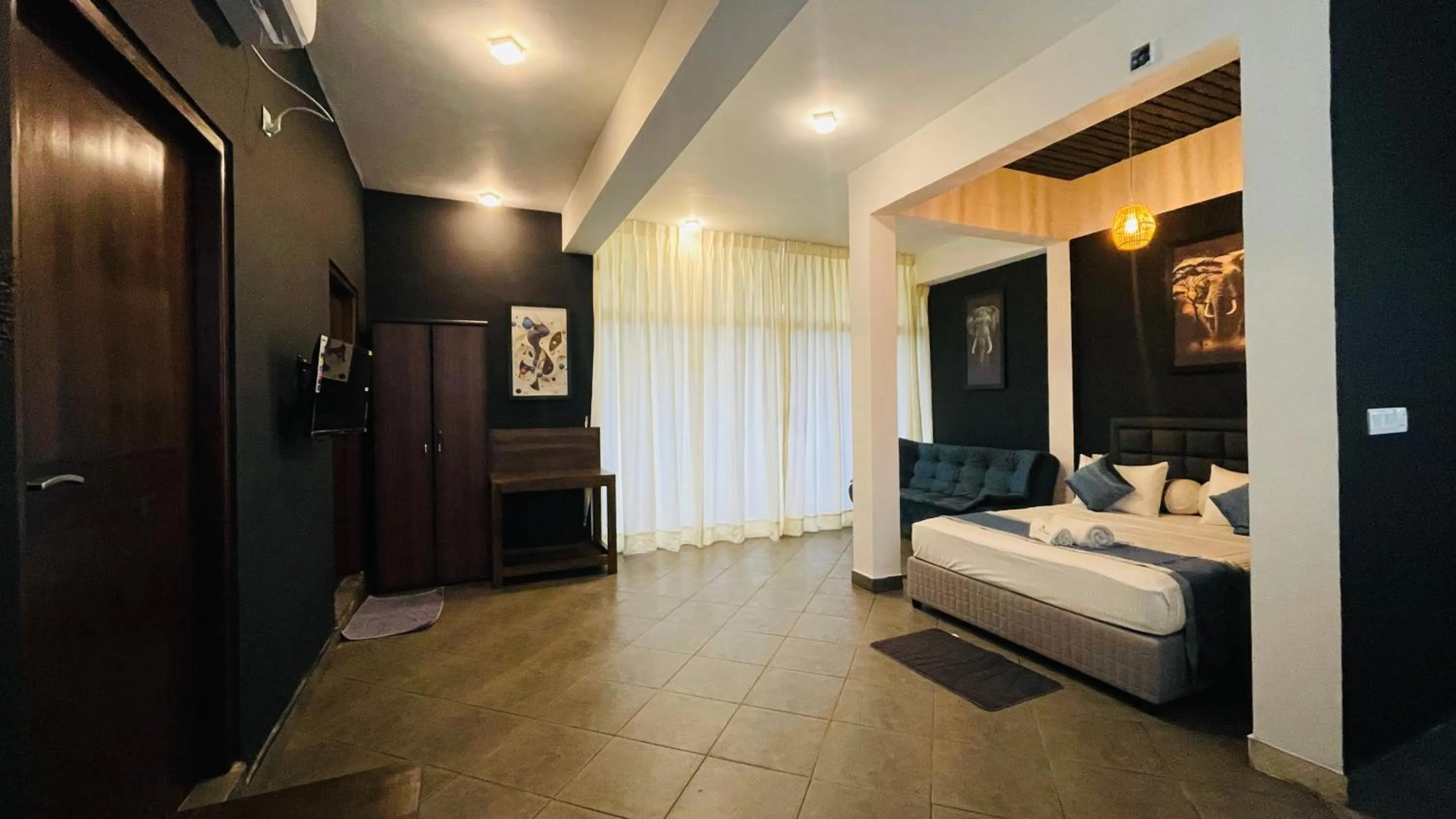 Bed in Blue Whale Resort & Kite Surfing