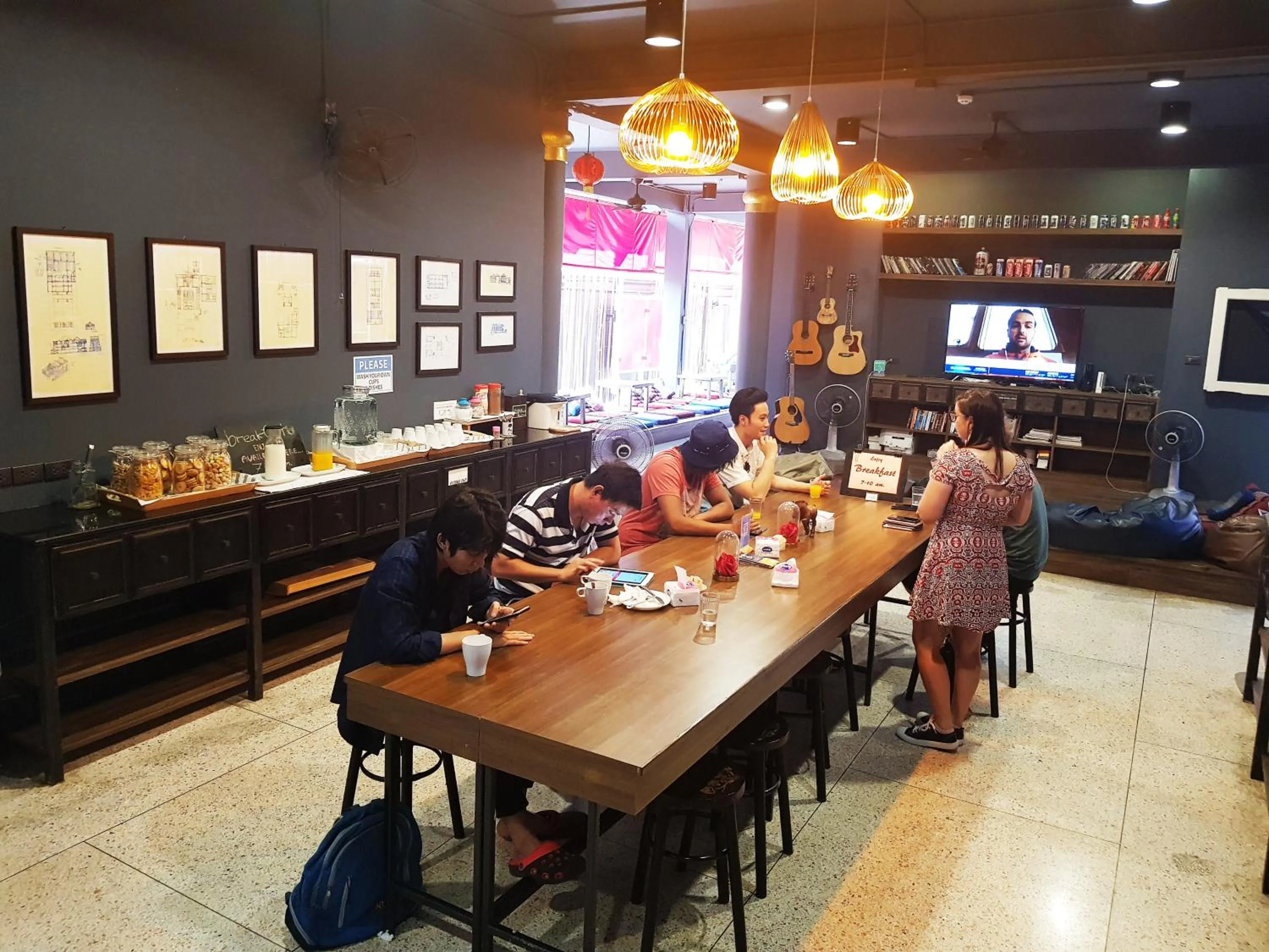 Communal lounge/ TV room in CLOUD on Saladaeng Silom Hostel Bangkok