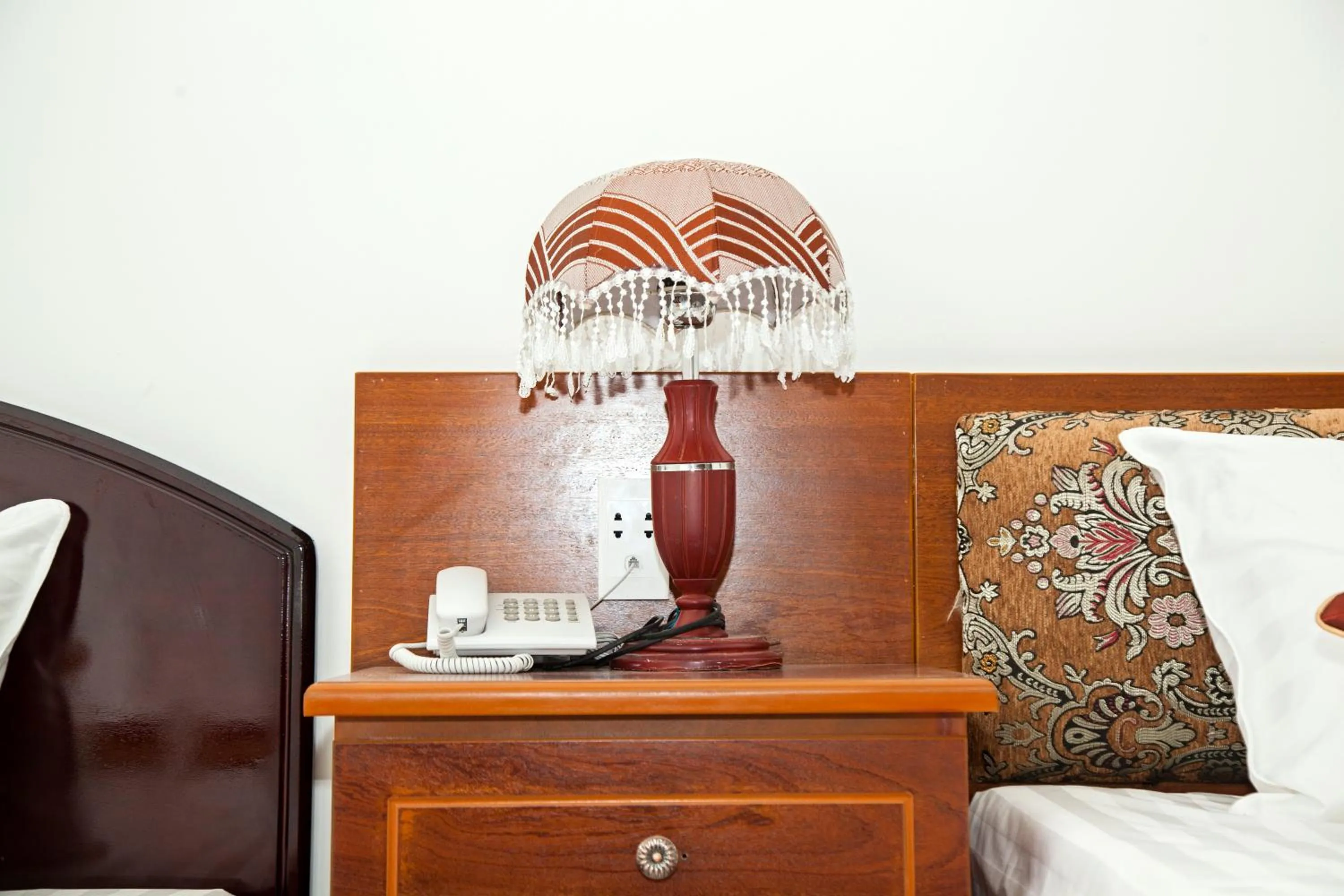 Bed in Satraco Royal Hotel