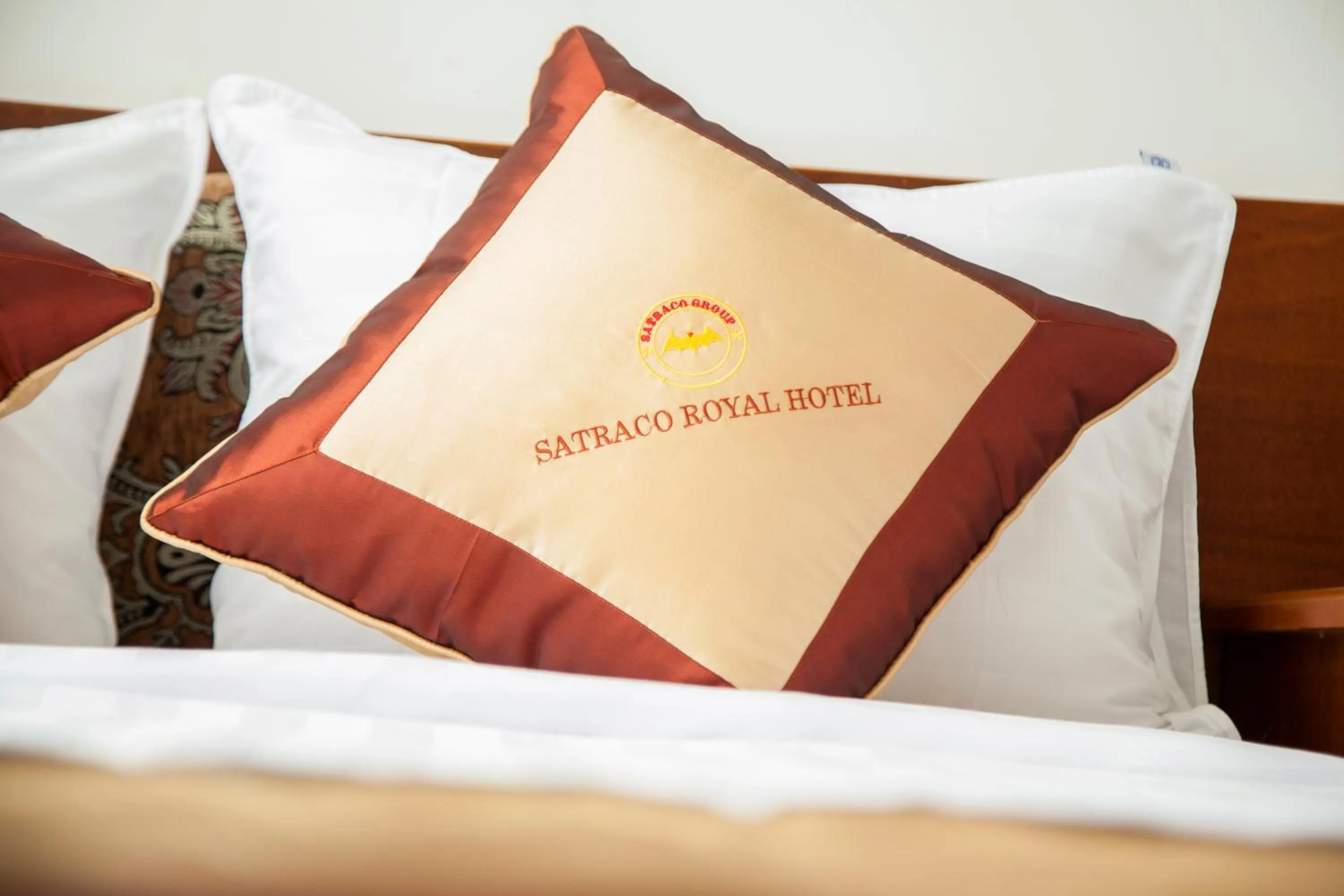 Bed in Satraco Royal Hotel
