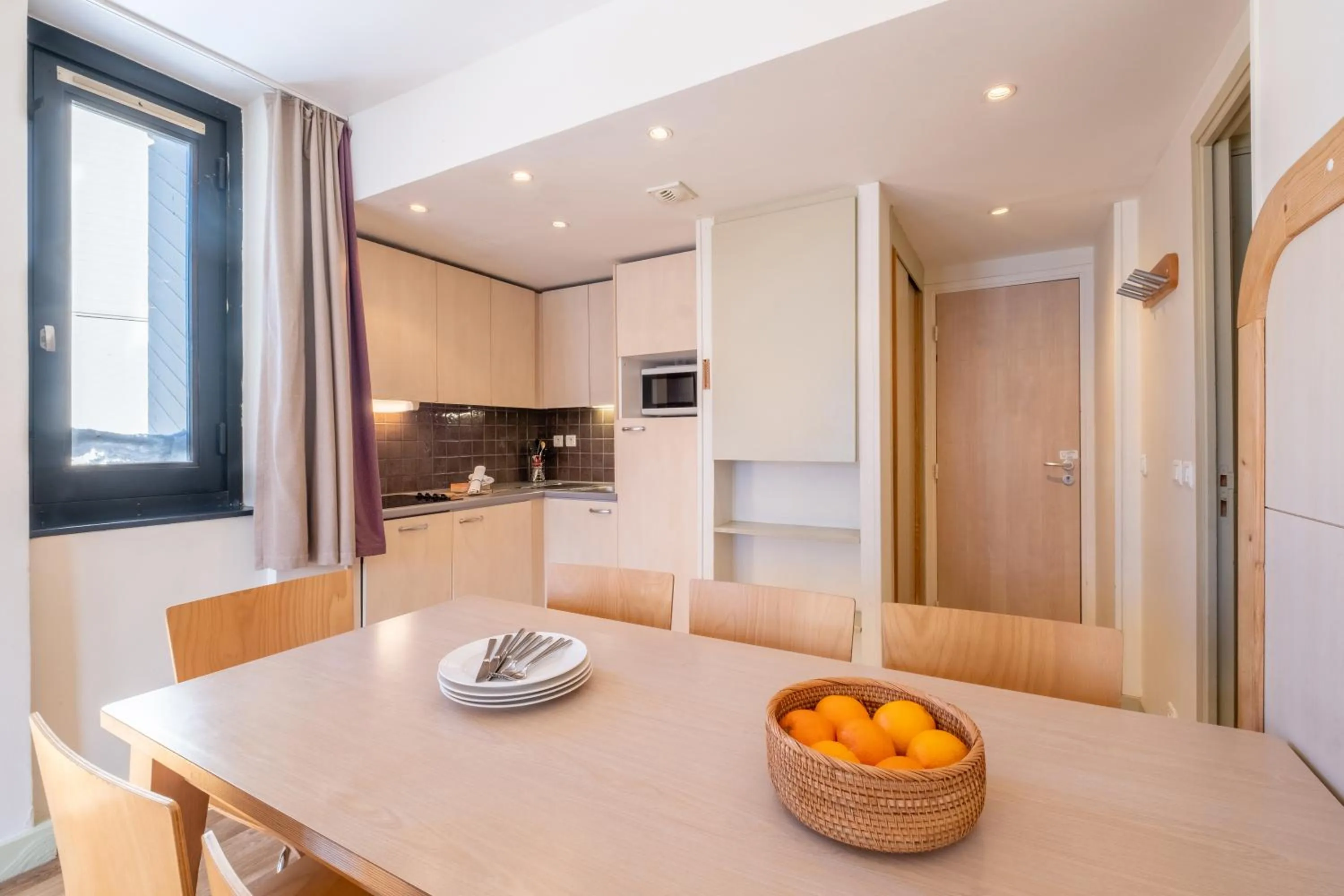 Kitchen or kitchenette in Résidence Pierre & Vacances La Forêt