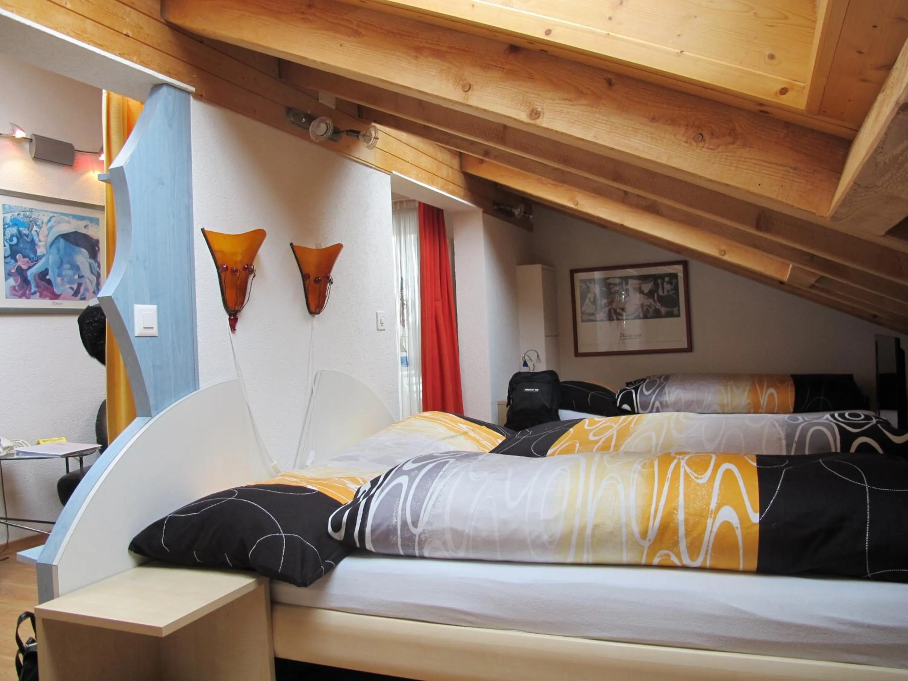 Bed in Artist Apartments & Hotel Garni