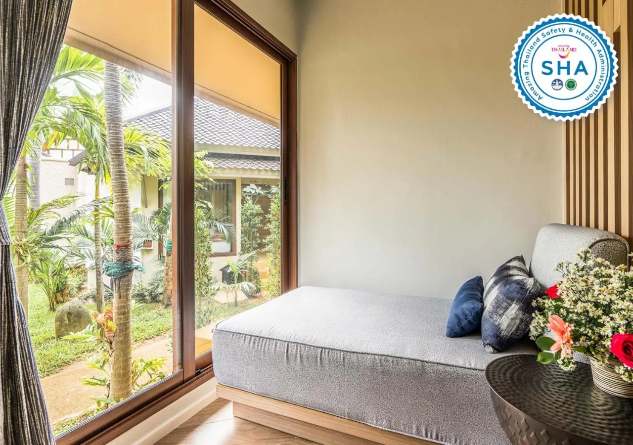 Seating area, Bed in Rummana Boutique Resort - SHA Plus