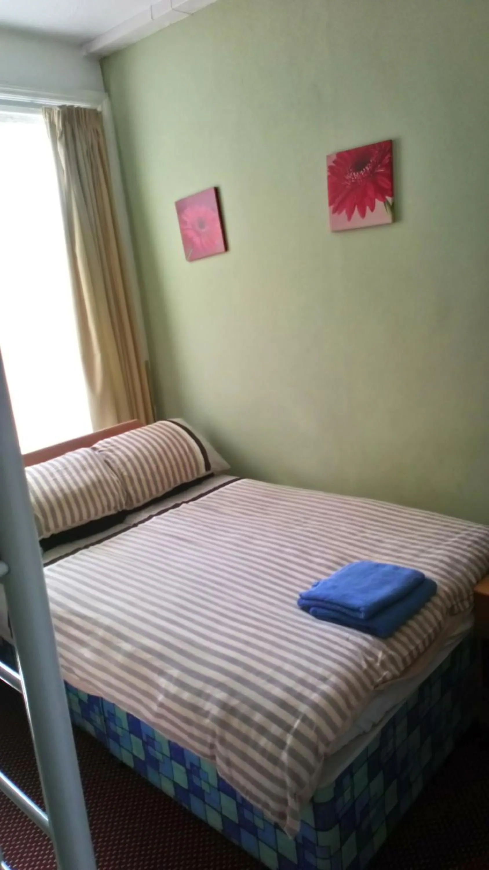 Bed in MyRoomz Golden Strand Hotel